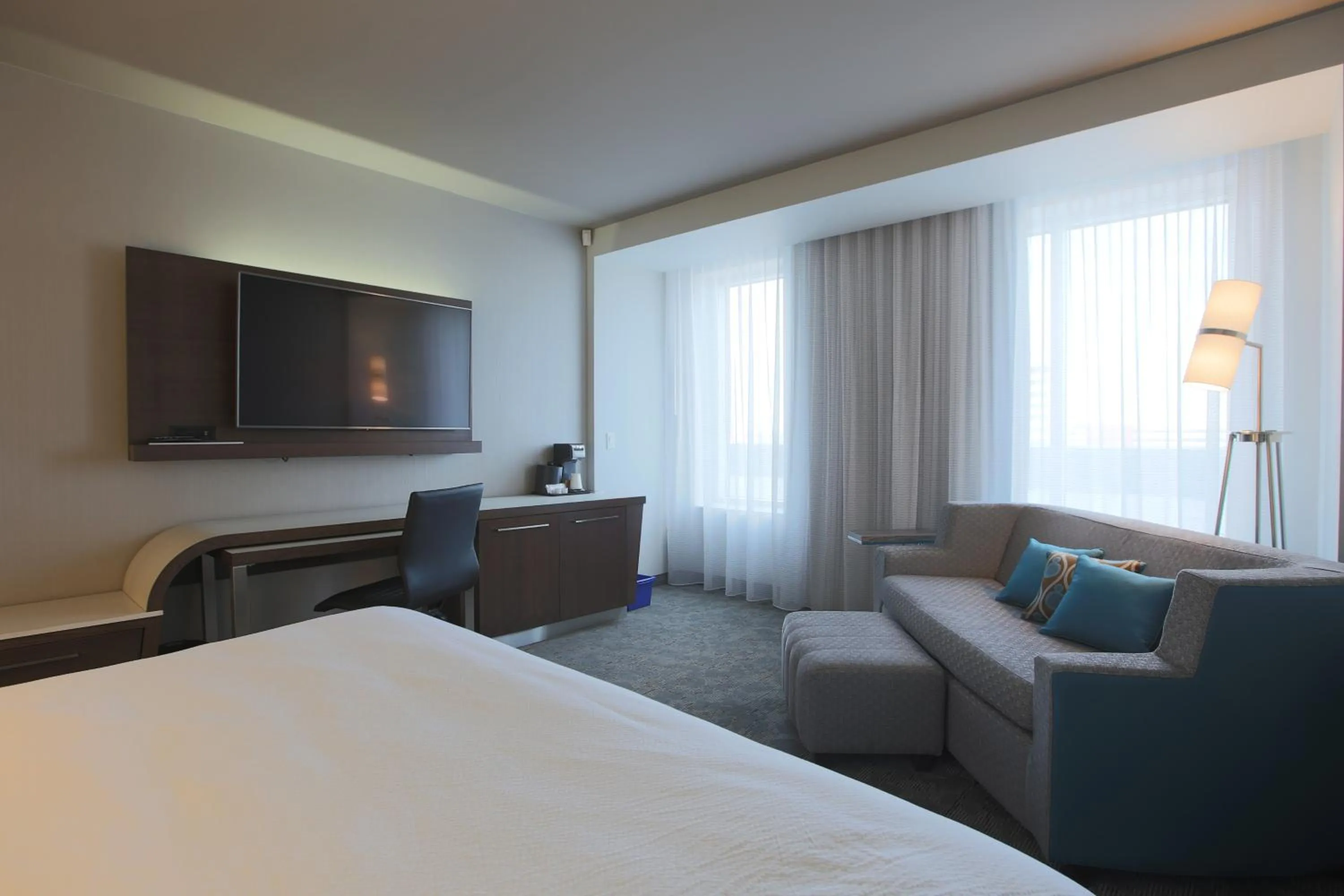 Bed in Courtyard by Marriott Montreal Brossard