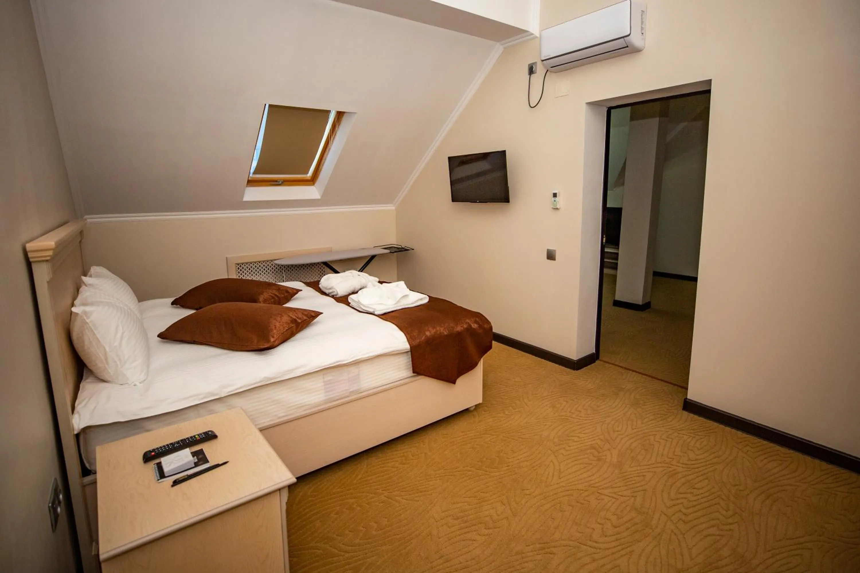 Bed in SULO Atyrau Hotel