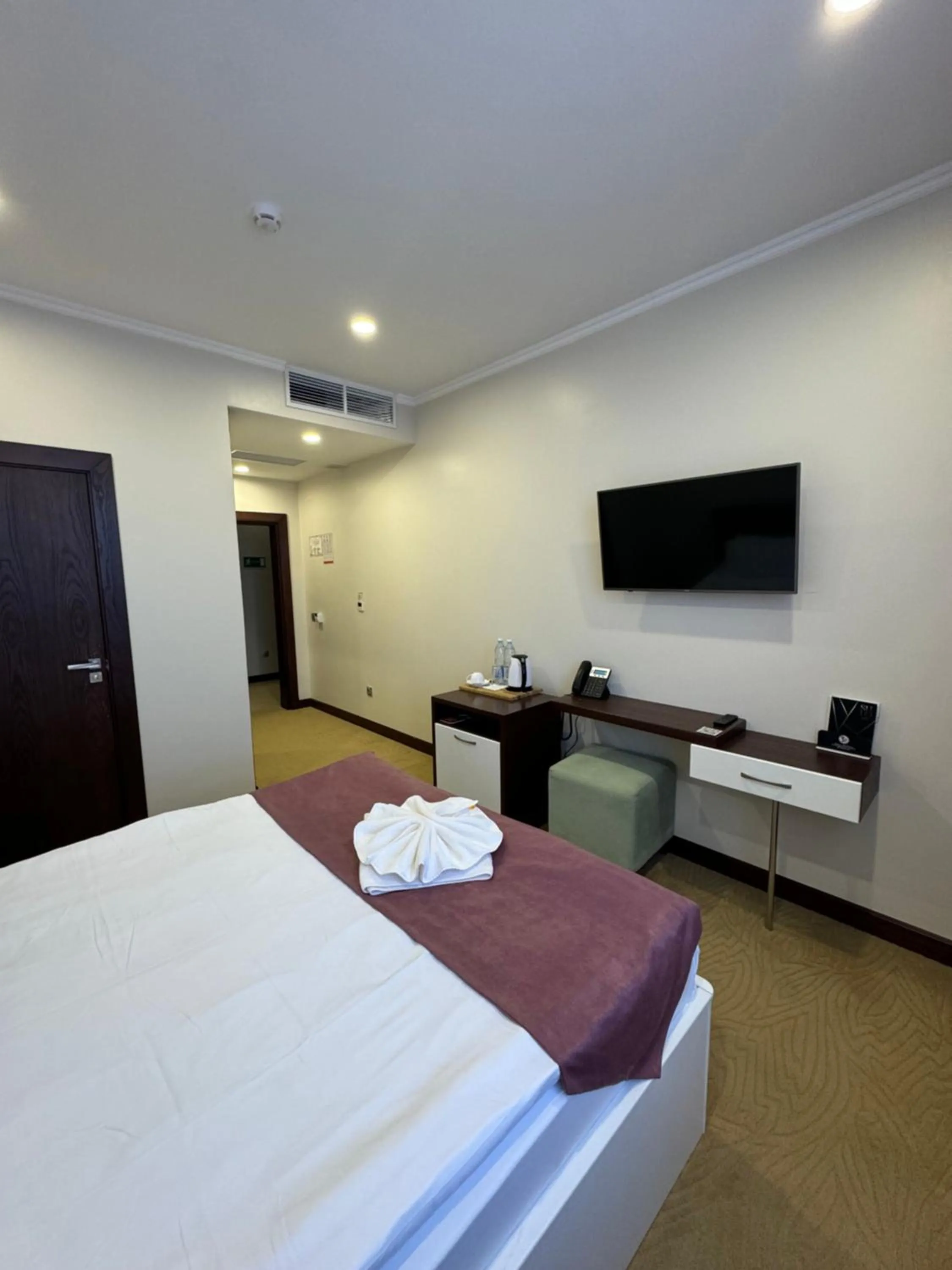 Bed in SULO Atyrau Hotel