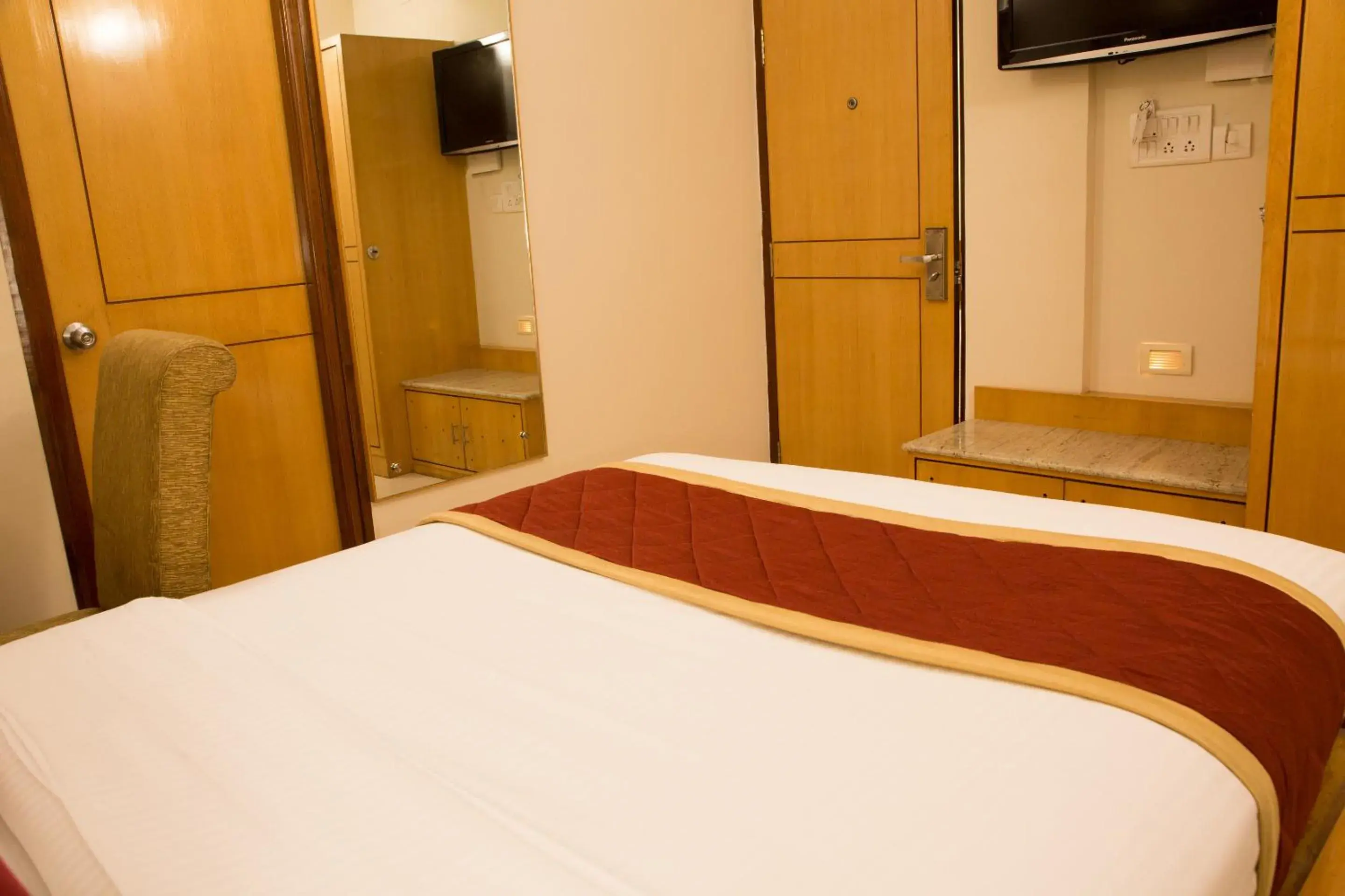 Bed in New Rainbow Business Hotel Bed in New Rainbow Business Hotel