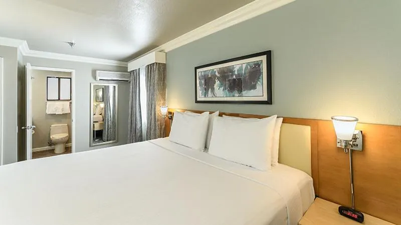 Bed in Alexis Park All Suite Resort