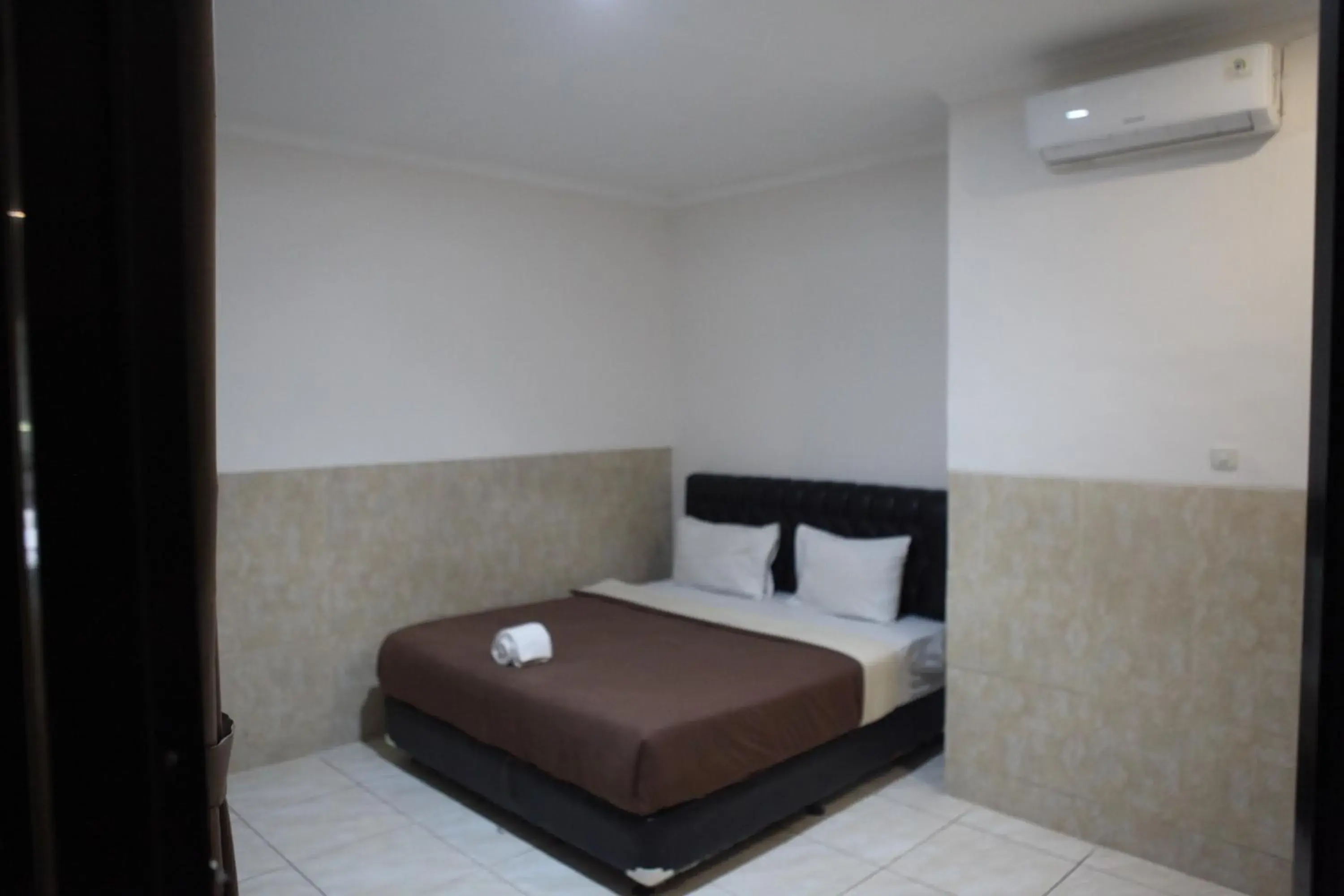 Bed in Rahayu Hotel Cirebon Bed in Rahayu Hotel Cirebon