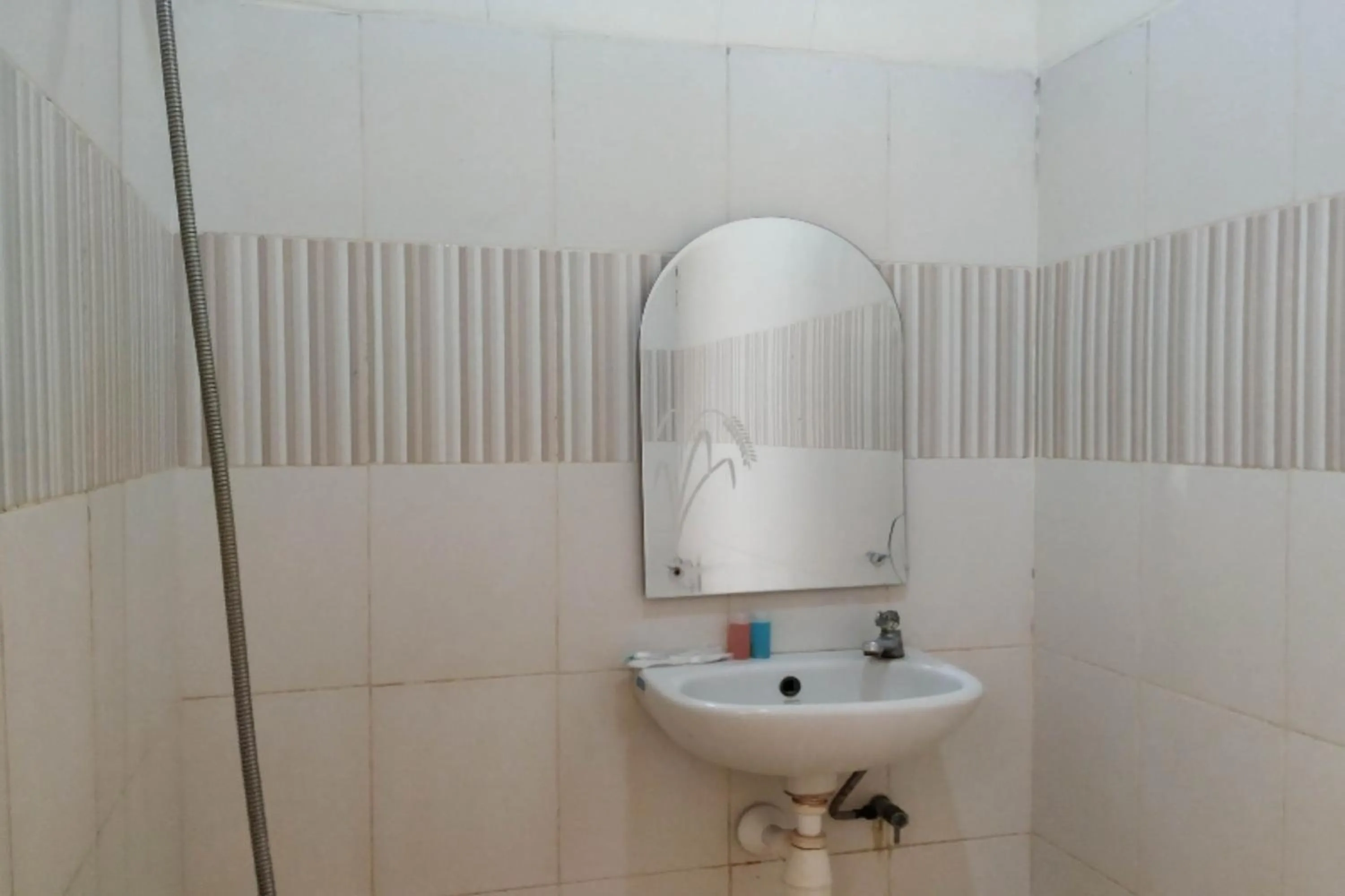 Bathroom in Hotel O Lulu Homestay