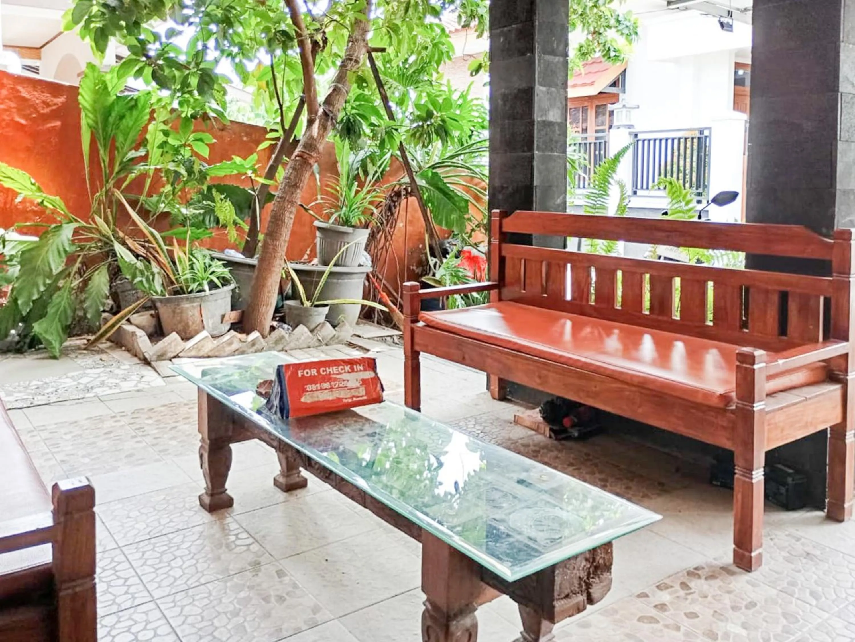 Seating area in Art Guesthouse Syariah Near Malioboro RedPartner