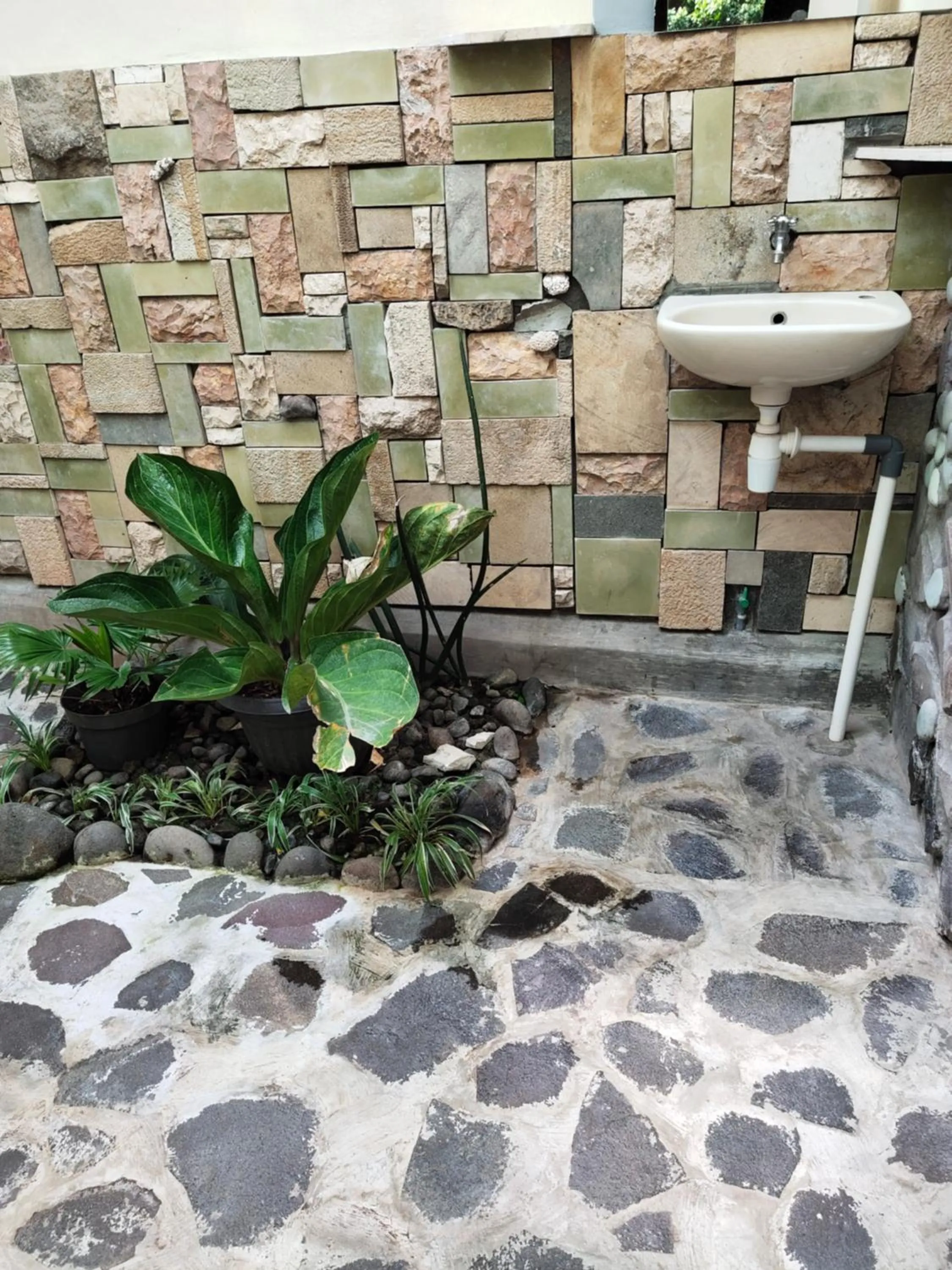 Bathroom in Mettaloka Guesthouse