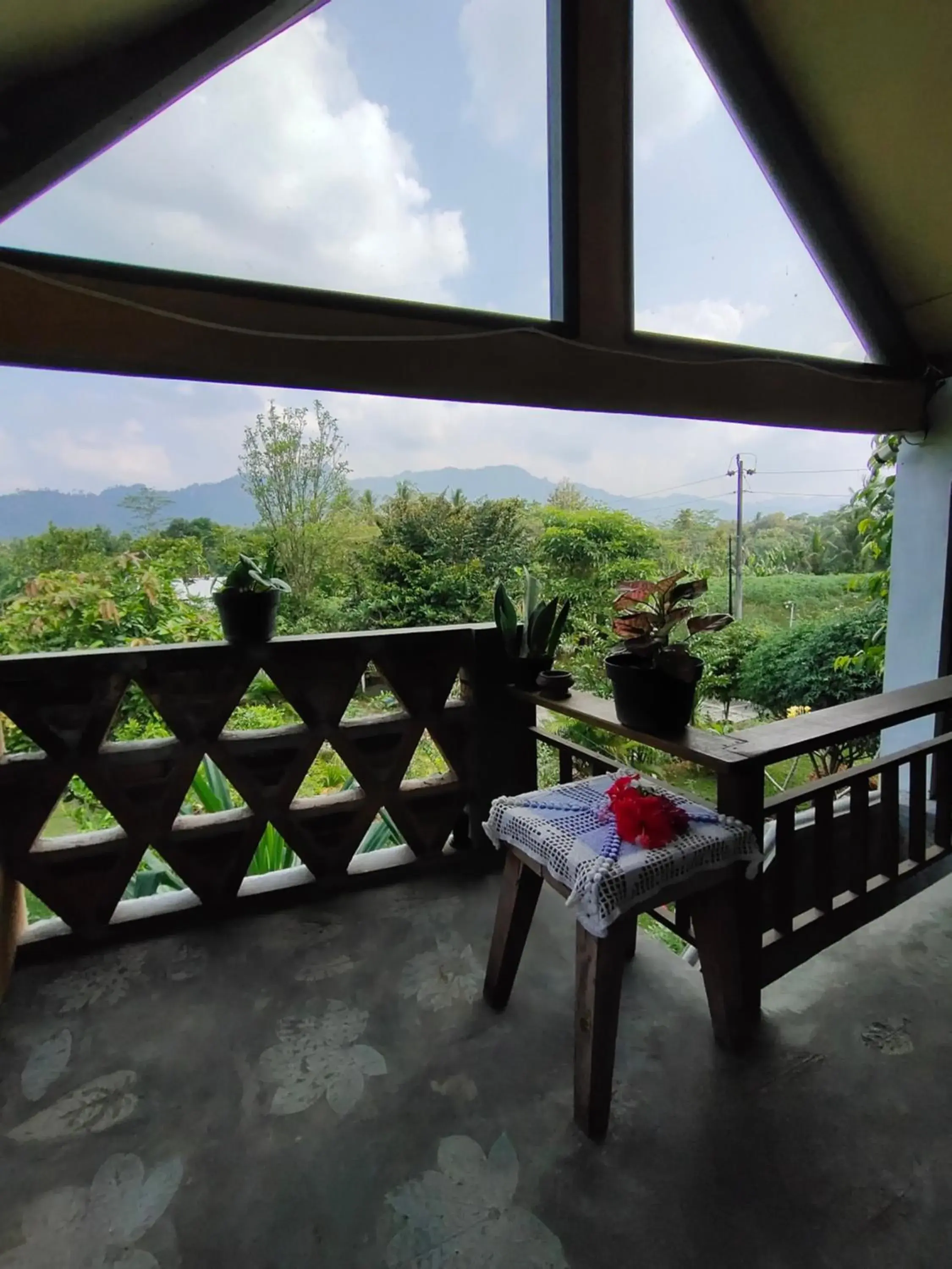 Triple Room with Balcony in Mettaloka Guesthouse Triple Room with Balcony in Mettaloka Guesthouse