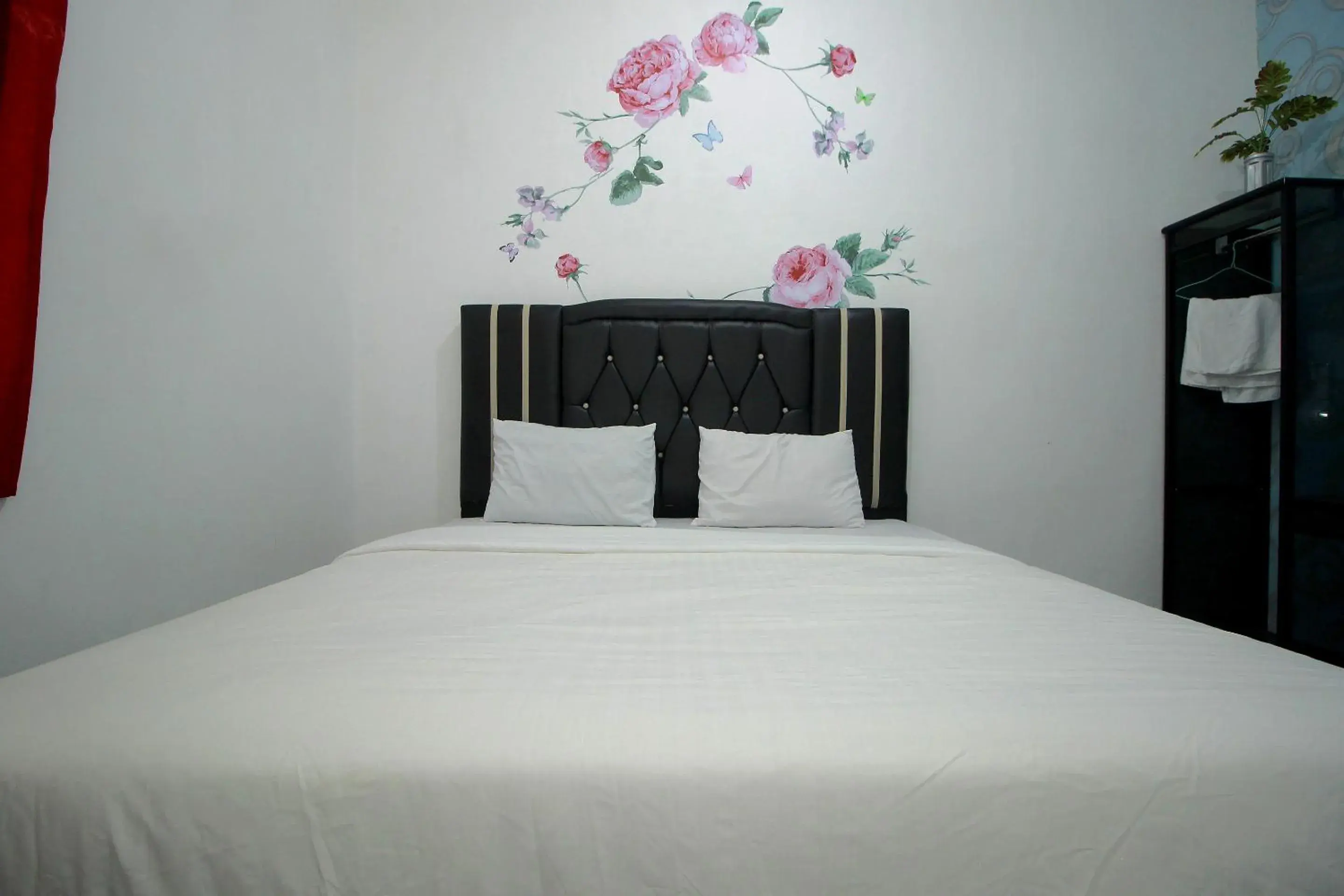 Bedroom in Hotel O Wisma Ria Bedroom in Hotel O Wisma Ria