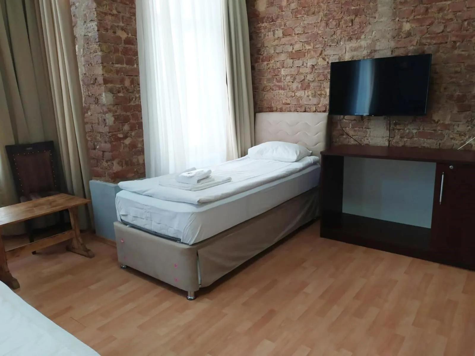 Bed in Taxim Hotel Marin