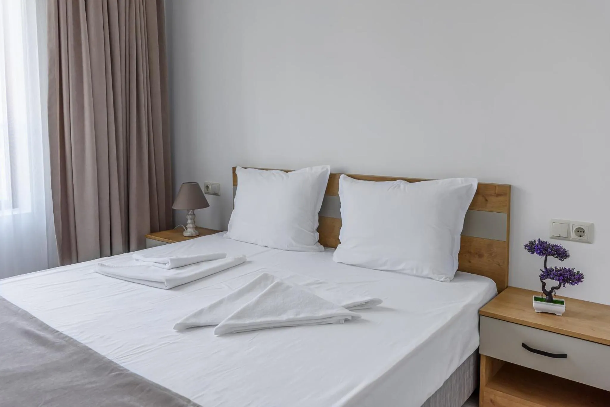 Bed in Lily Beach Resort