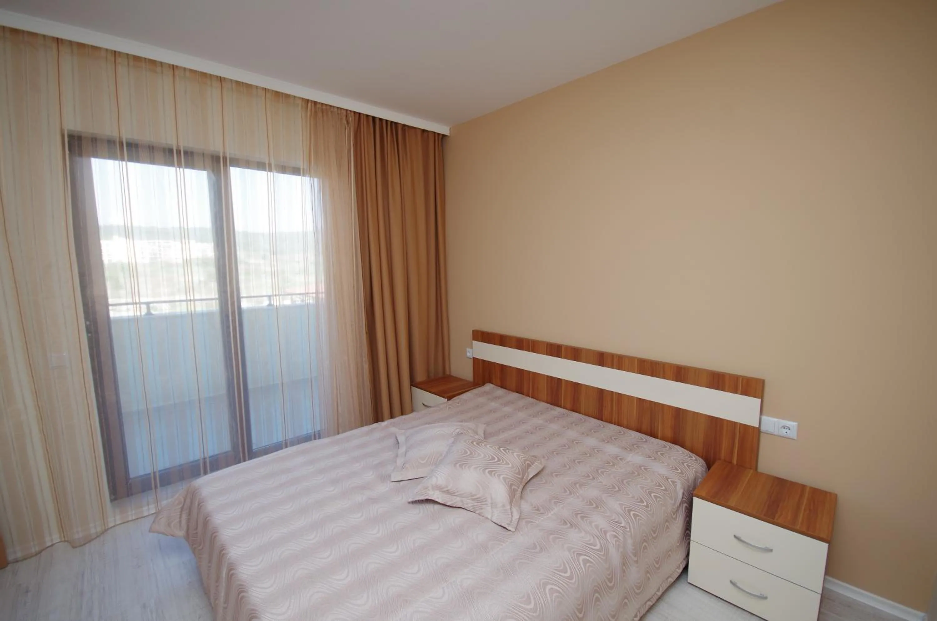 Bed in Lily Beach Resort