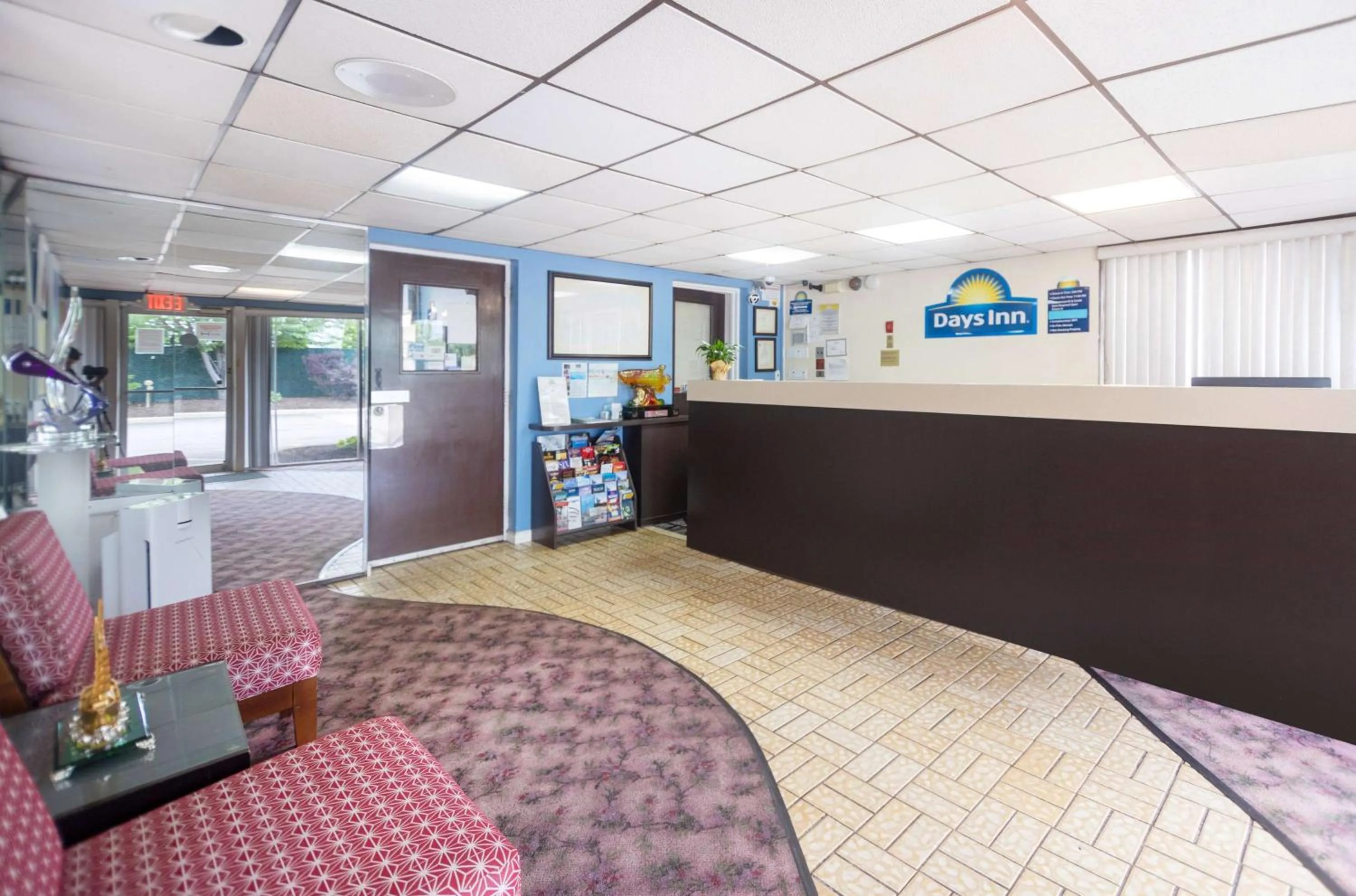 Lobby or reception in Days Inn by Wyndham Hicksville Long Island