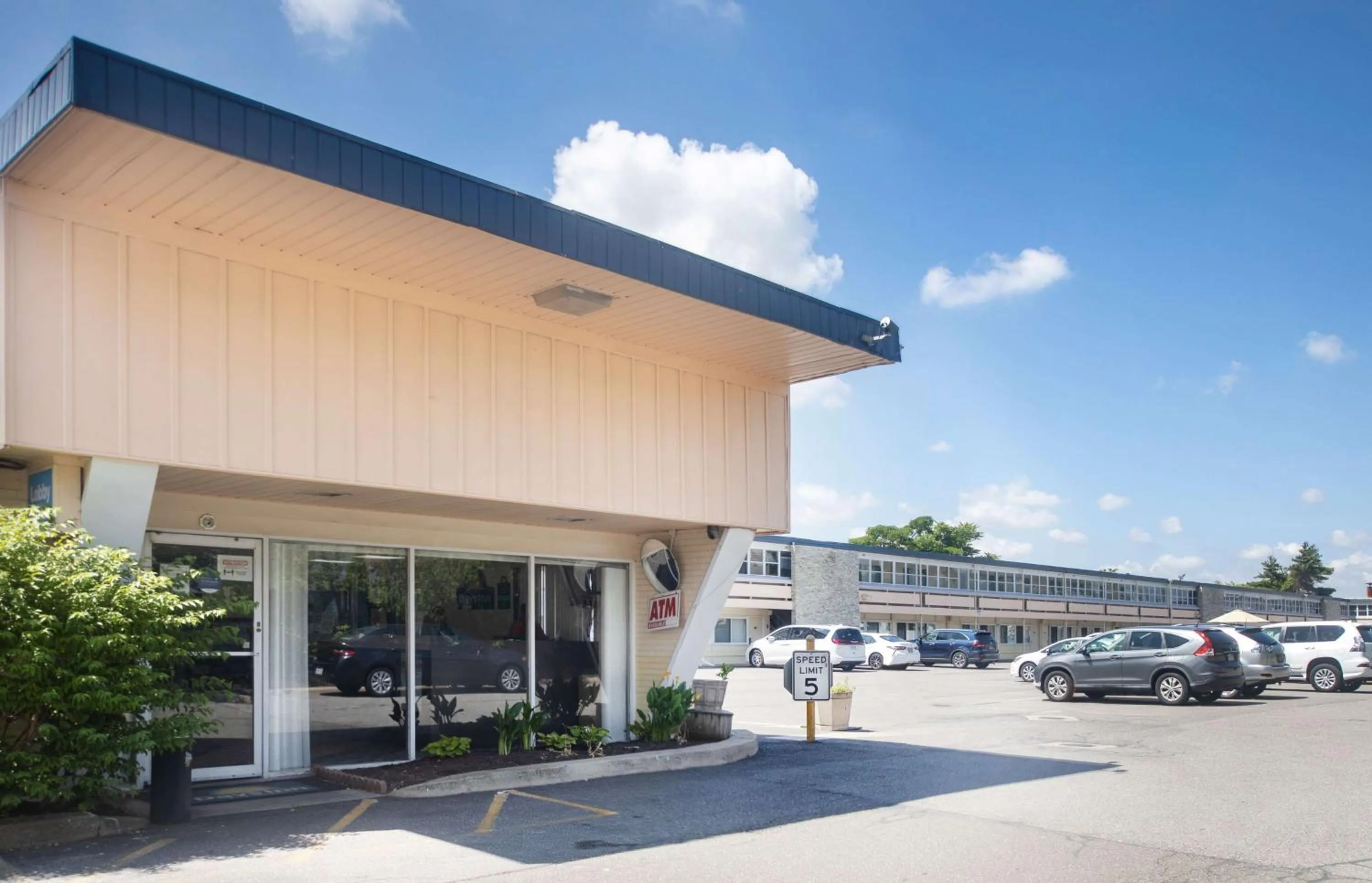 Property building in Days Inn by Wyndham Hicksville Long Island