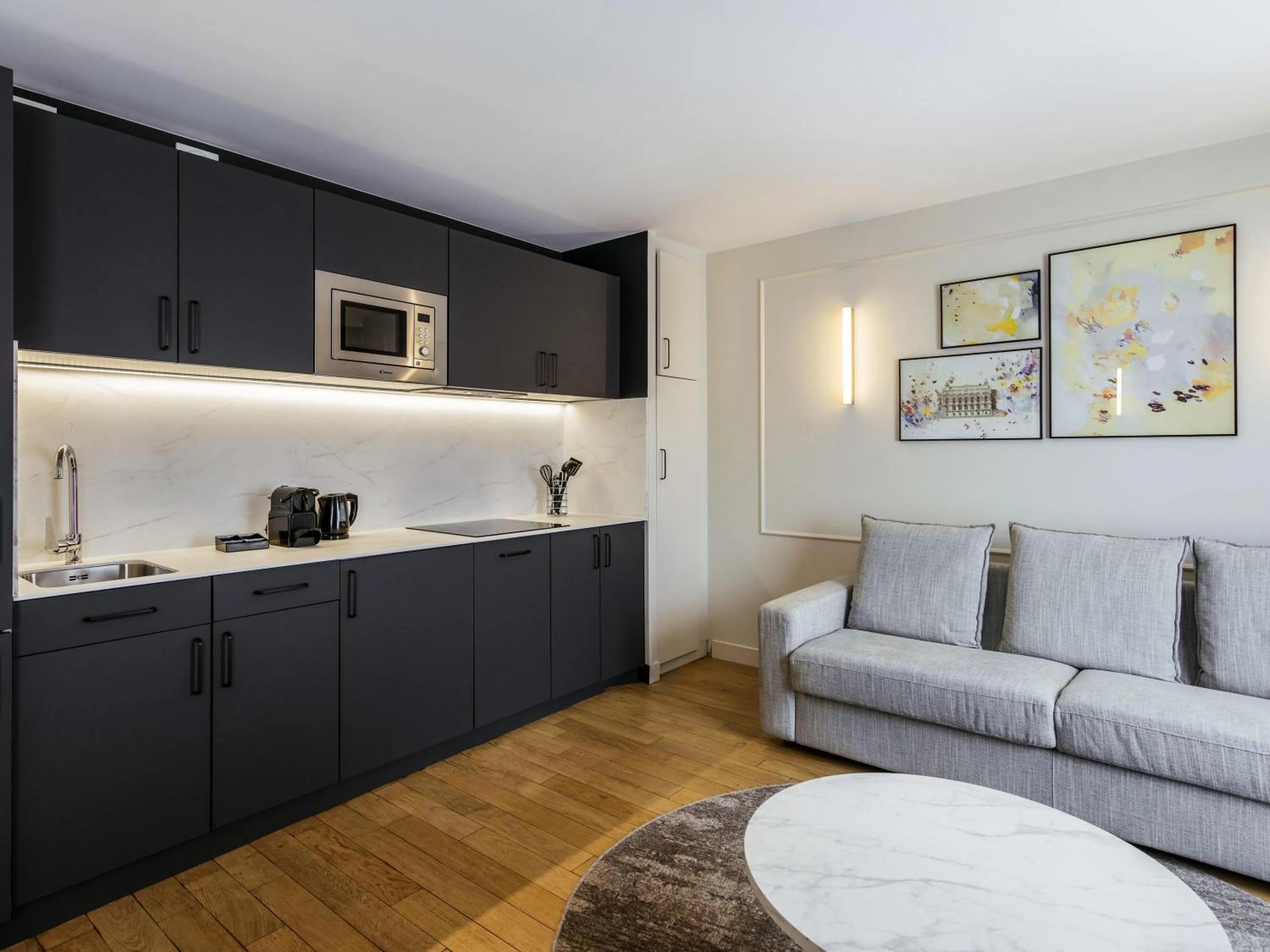 Bedroom in Aparthotel Adagio Paris Opéra