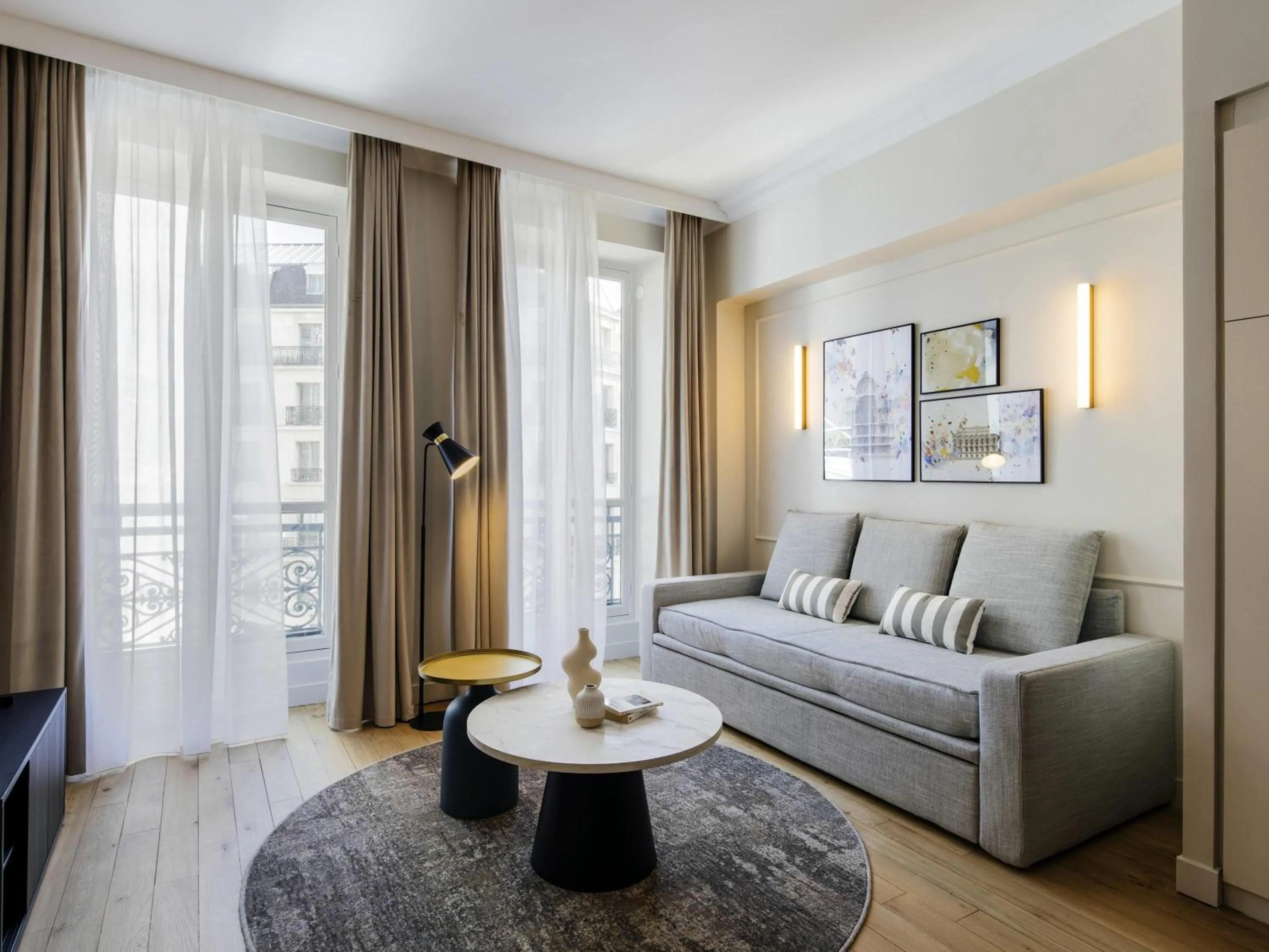 Bedroom in Aparthotel Adagio Paris Opéra