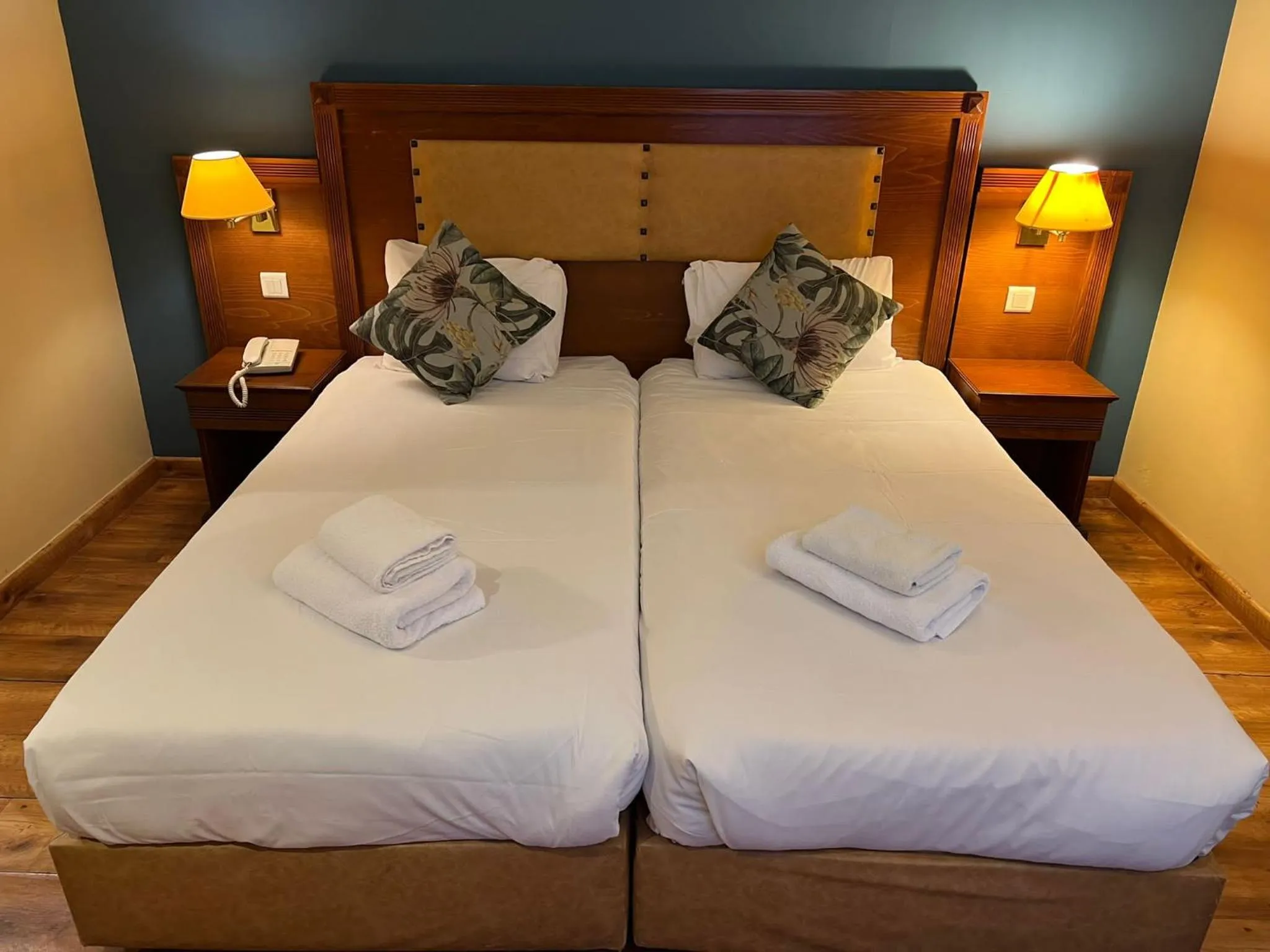 Bed in 121 Paris Hotel