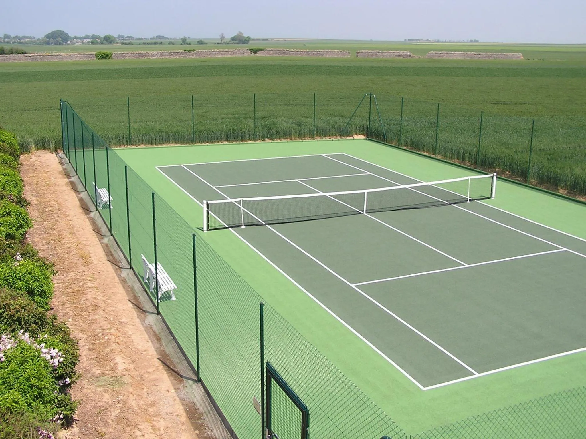 Tennis court in Ferme de la Rançonnière - Hôtel & Restaurant
