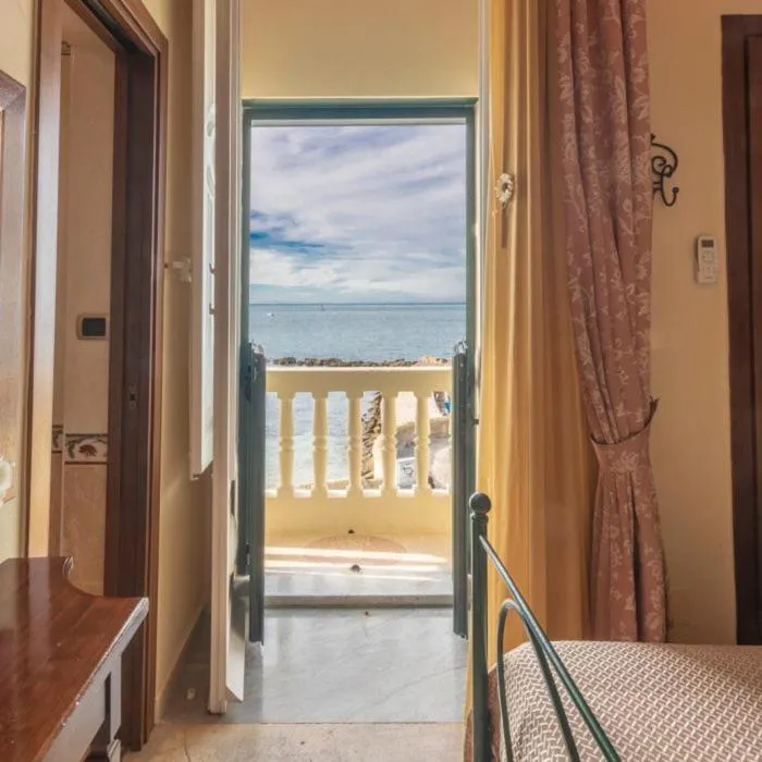 Bed in B&B La Riviera