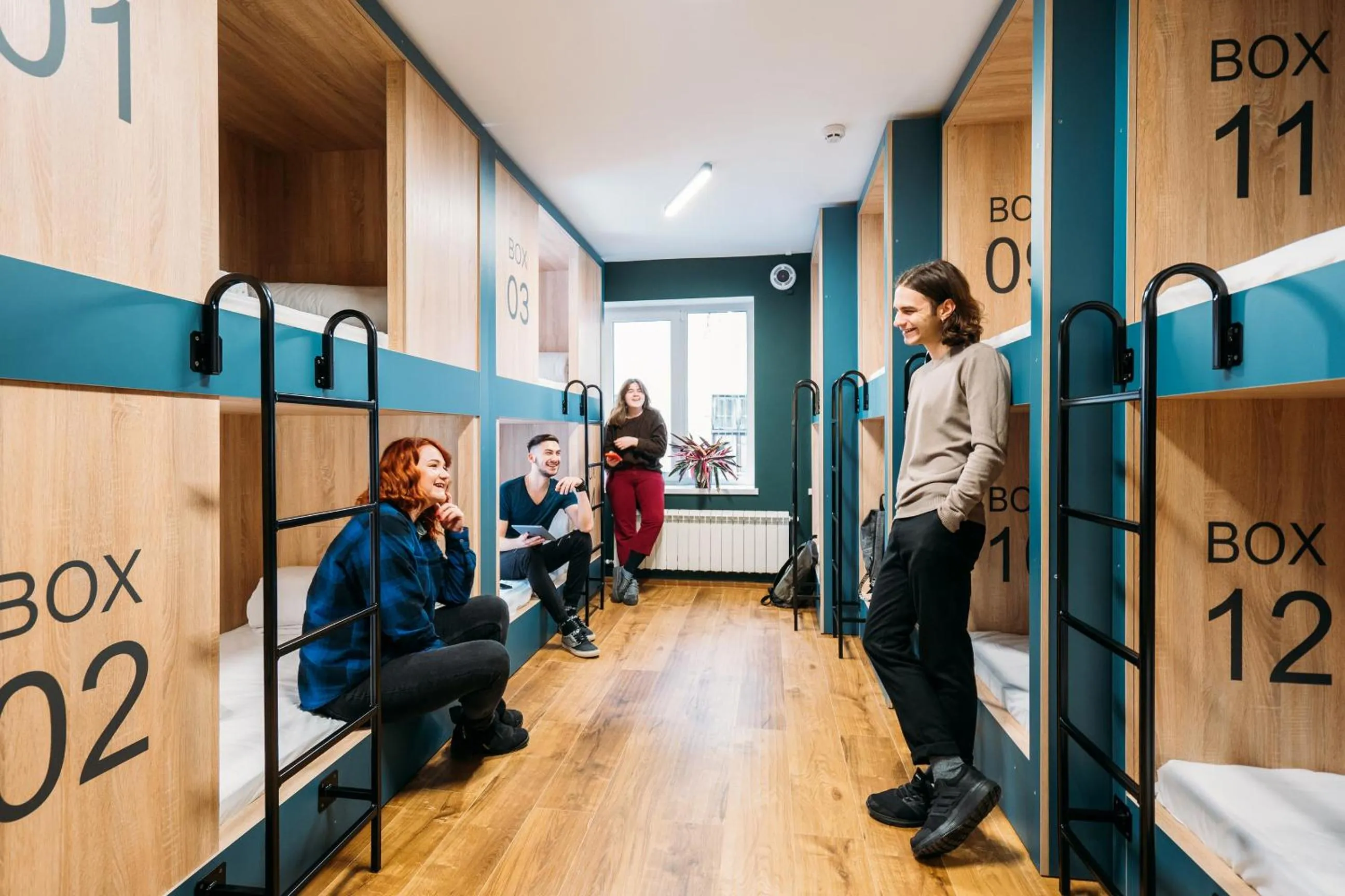 People in Yard Hostel & Coffee