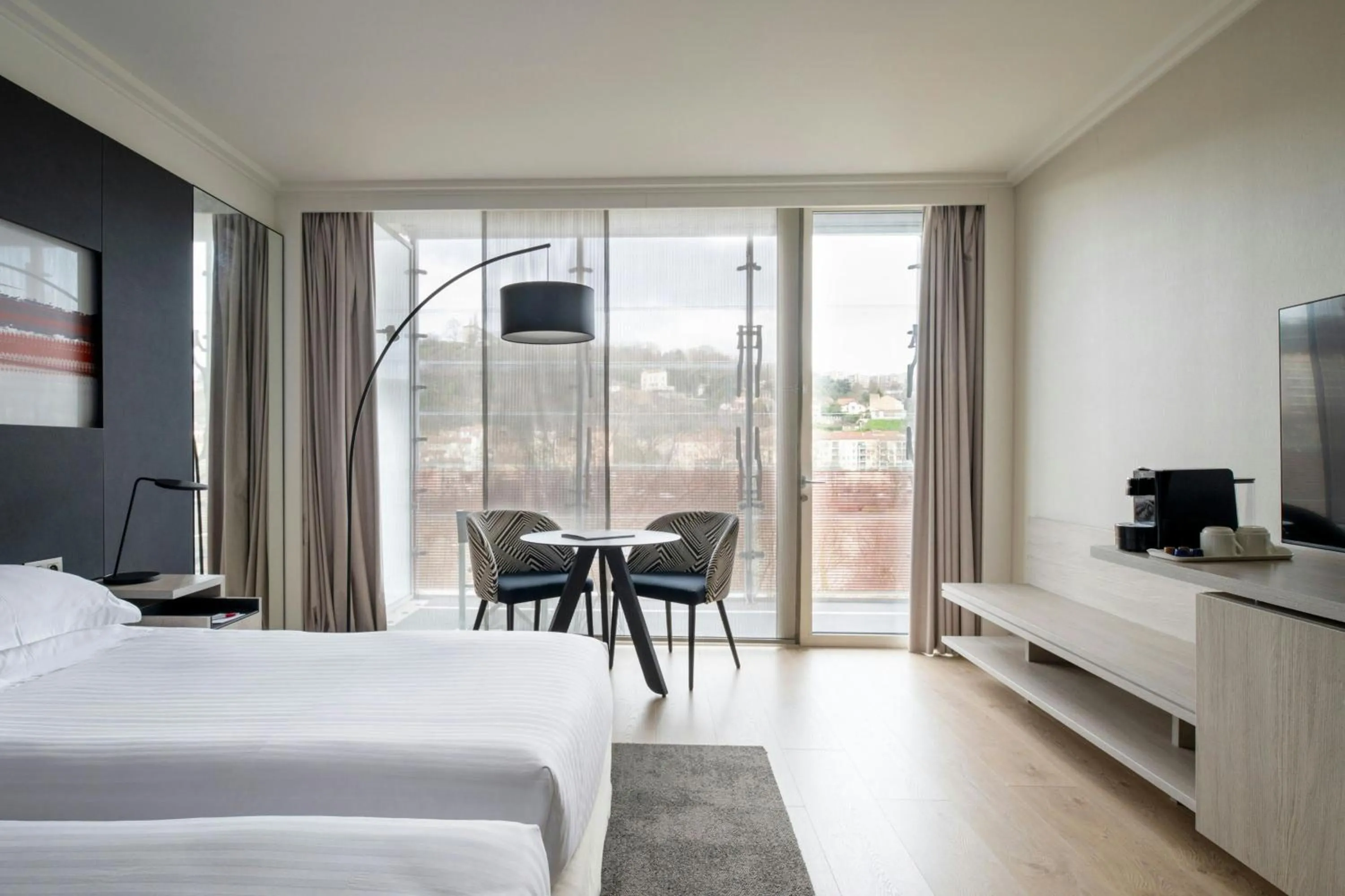 Photo of the whole room, Bed in Lyon Marriott Hotel Cité Internationale