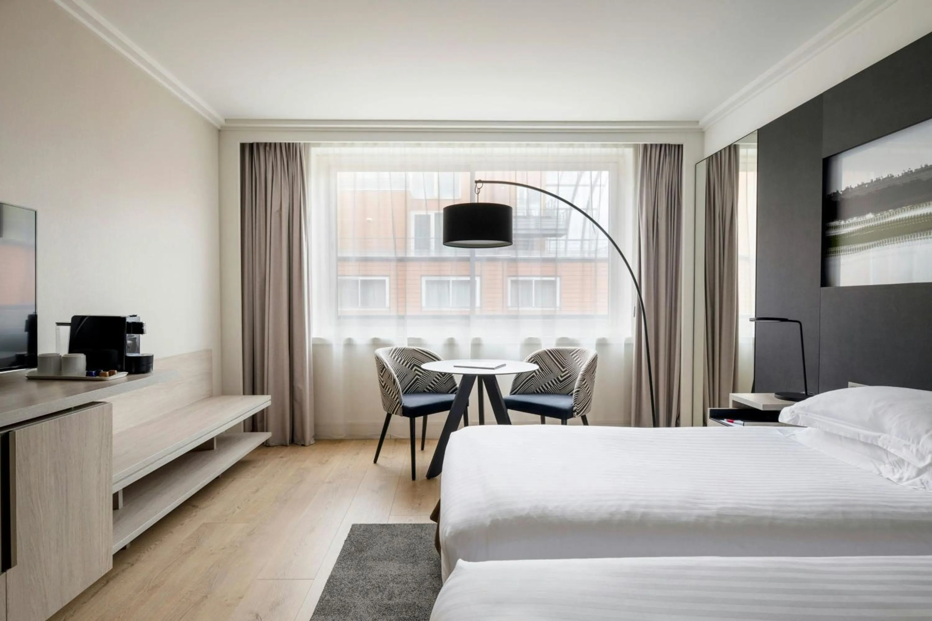 Photo of the whole room, Bed in Lyon Marriott Hotel Cité Internationale