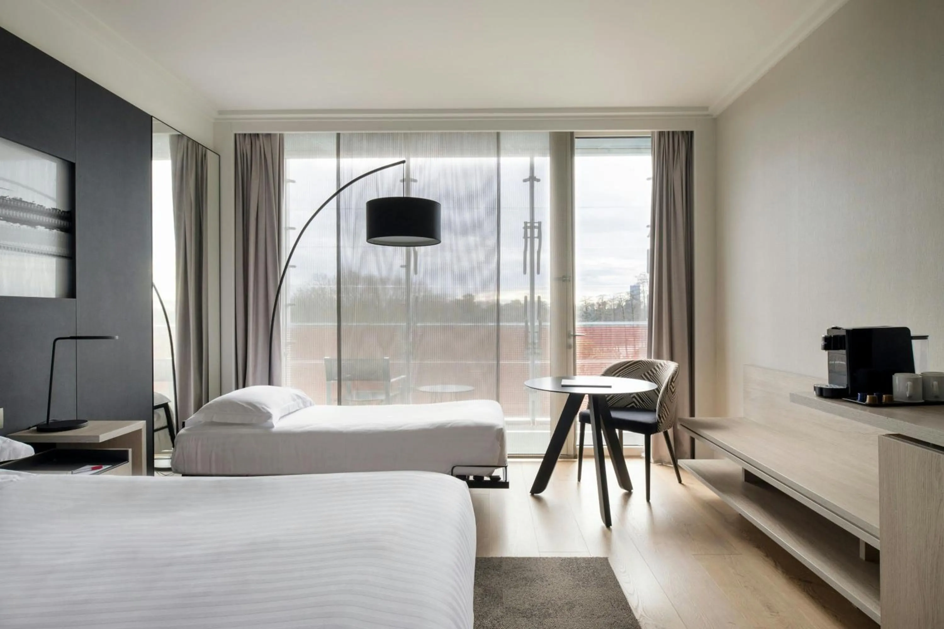 Photo of the whole room, Bed in Lyon Marriott Hotel Cité Internationale
