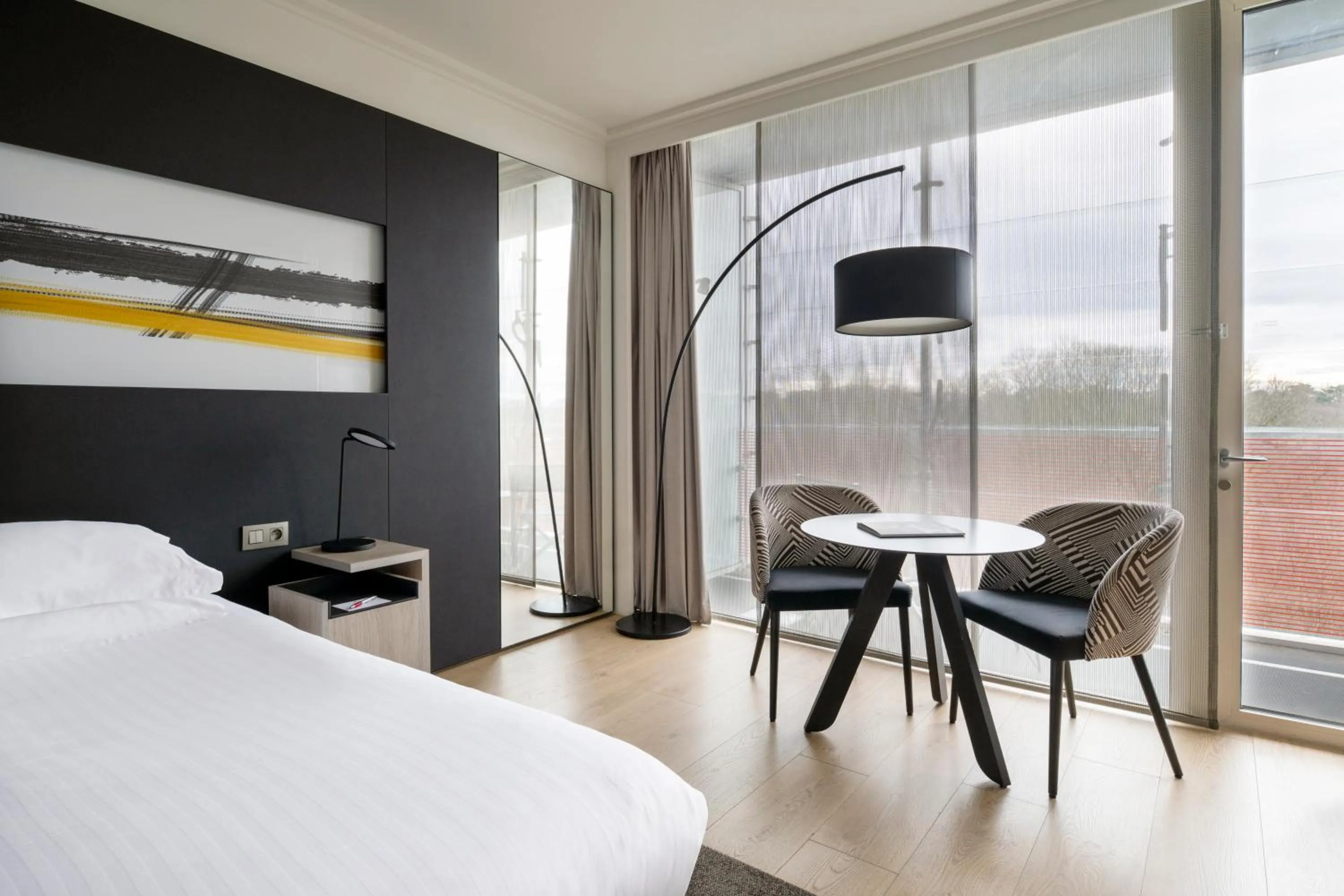 Balcony/Terrace, Bed in Lyon Marriott Hotel Cité Internationale