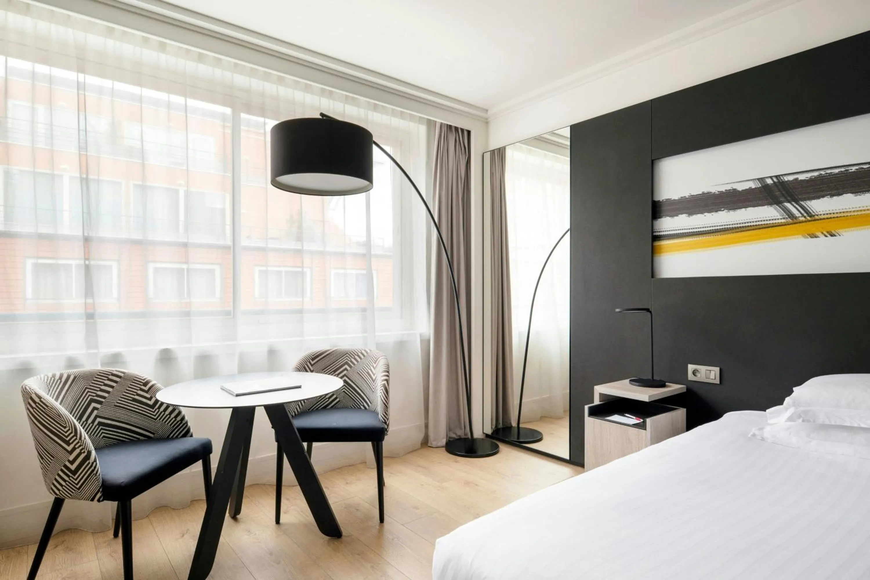 Photo of the whole room, Bed in Lyon Marriott Hotel Cité Internationale