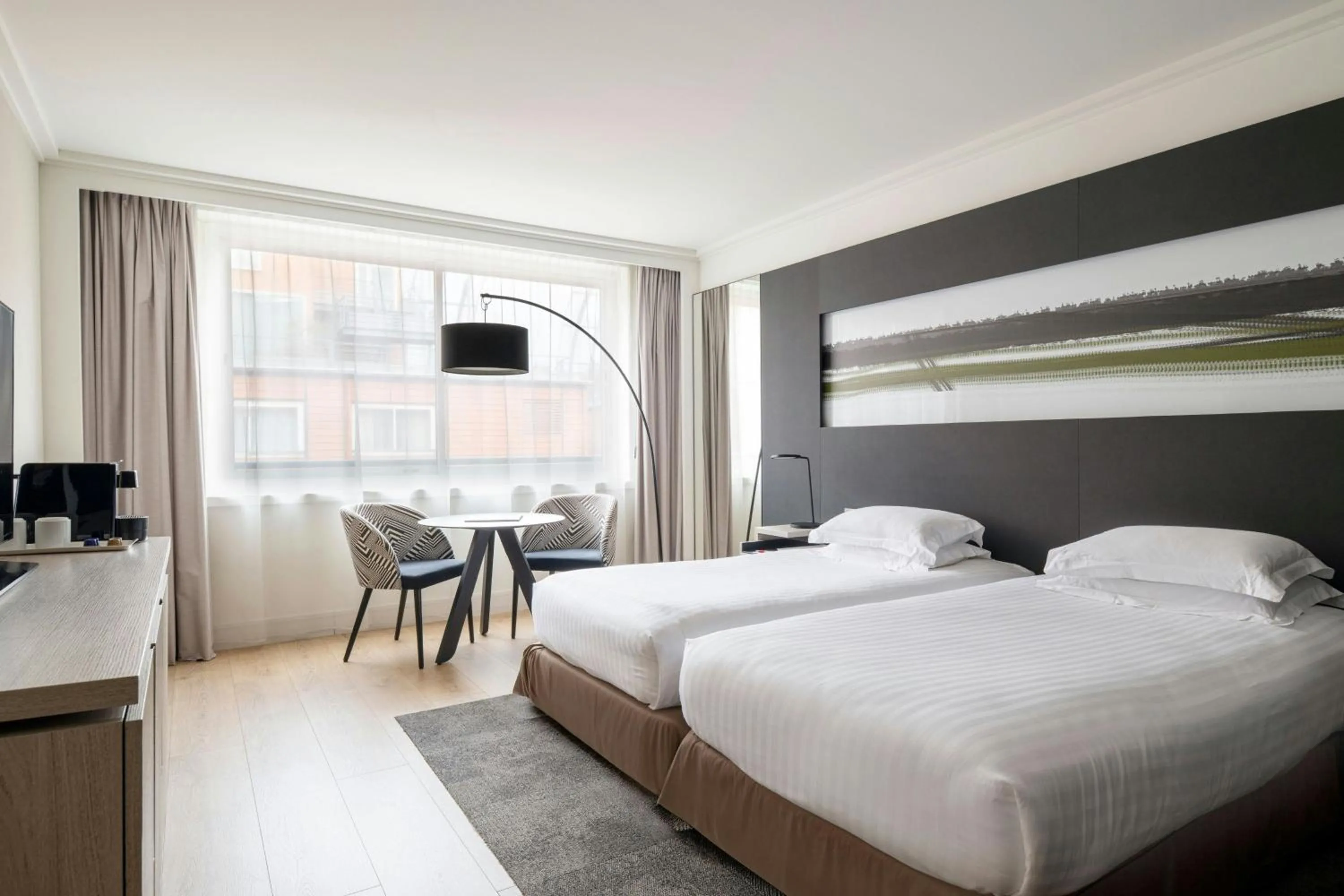 Photo of the whole room, Bed in Lyon Marriott Hotel Cité Internationale