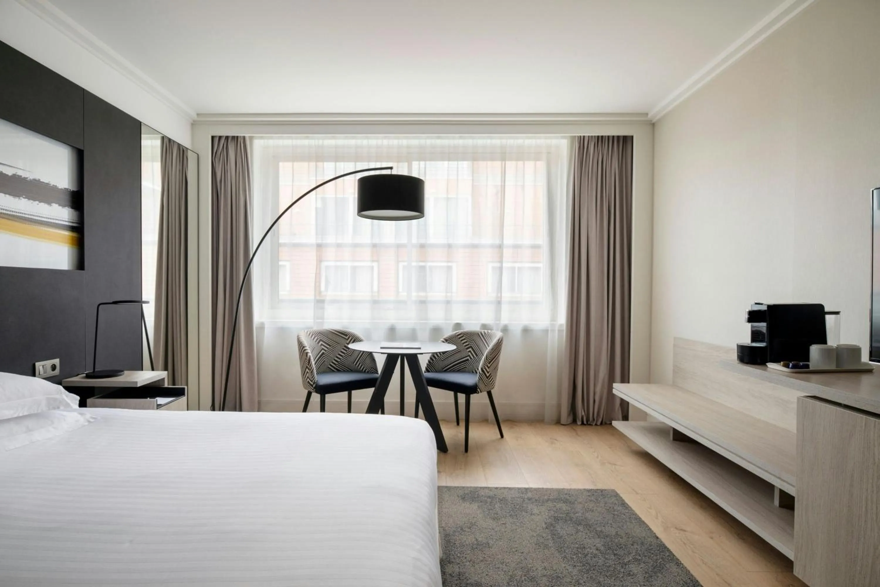Photo of the whole room, Bed in Lyon Marriott Hotel Cité Internationale