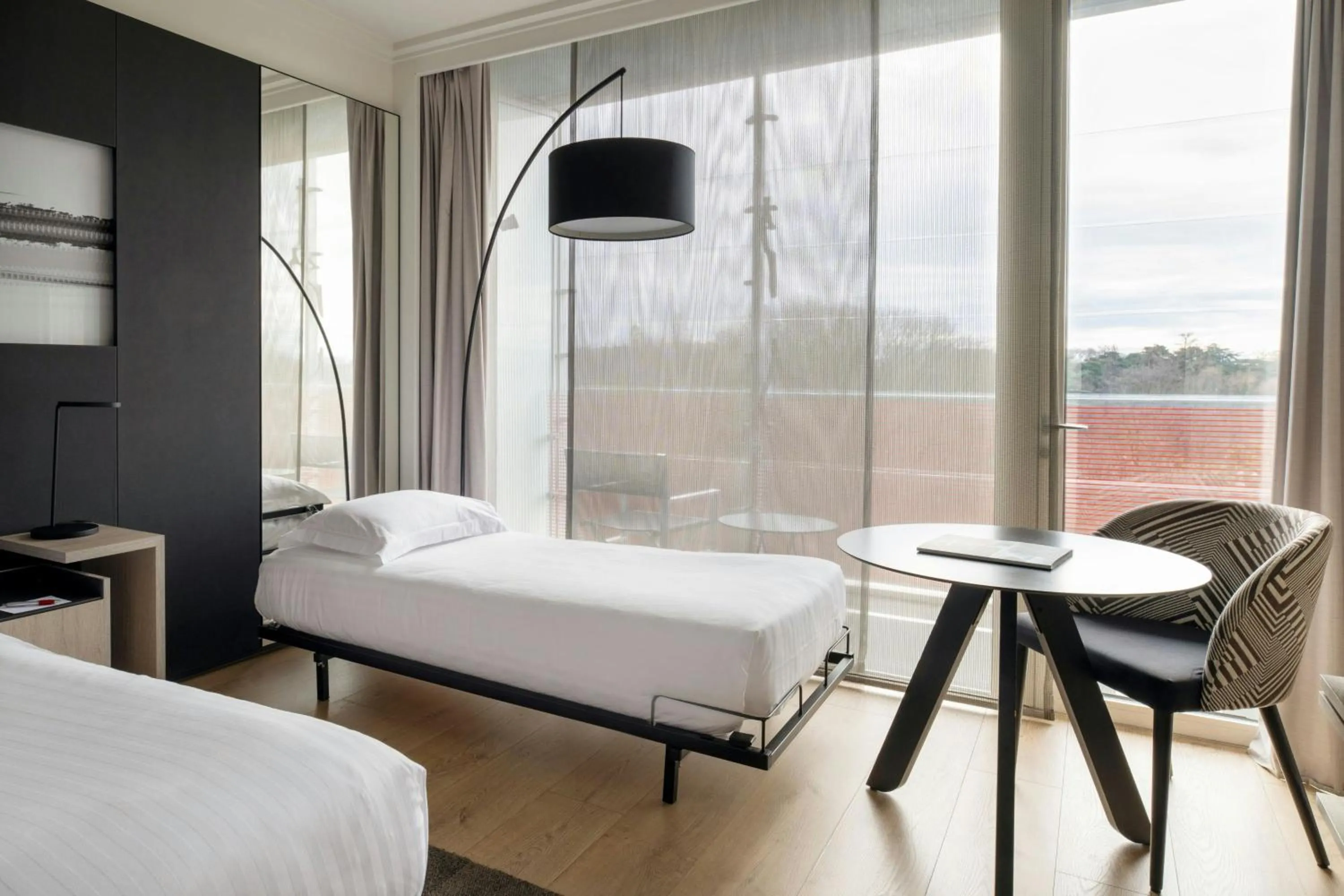 Photo of the whole room, Bed in Lyon Marriott Hotel Cité Internationale