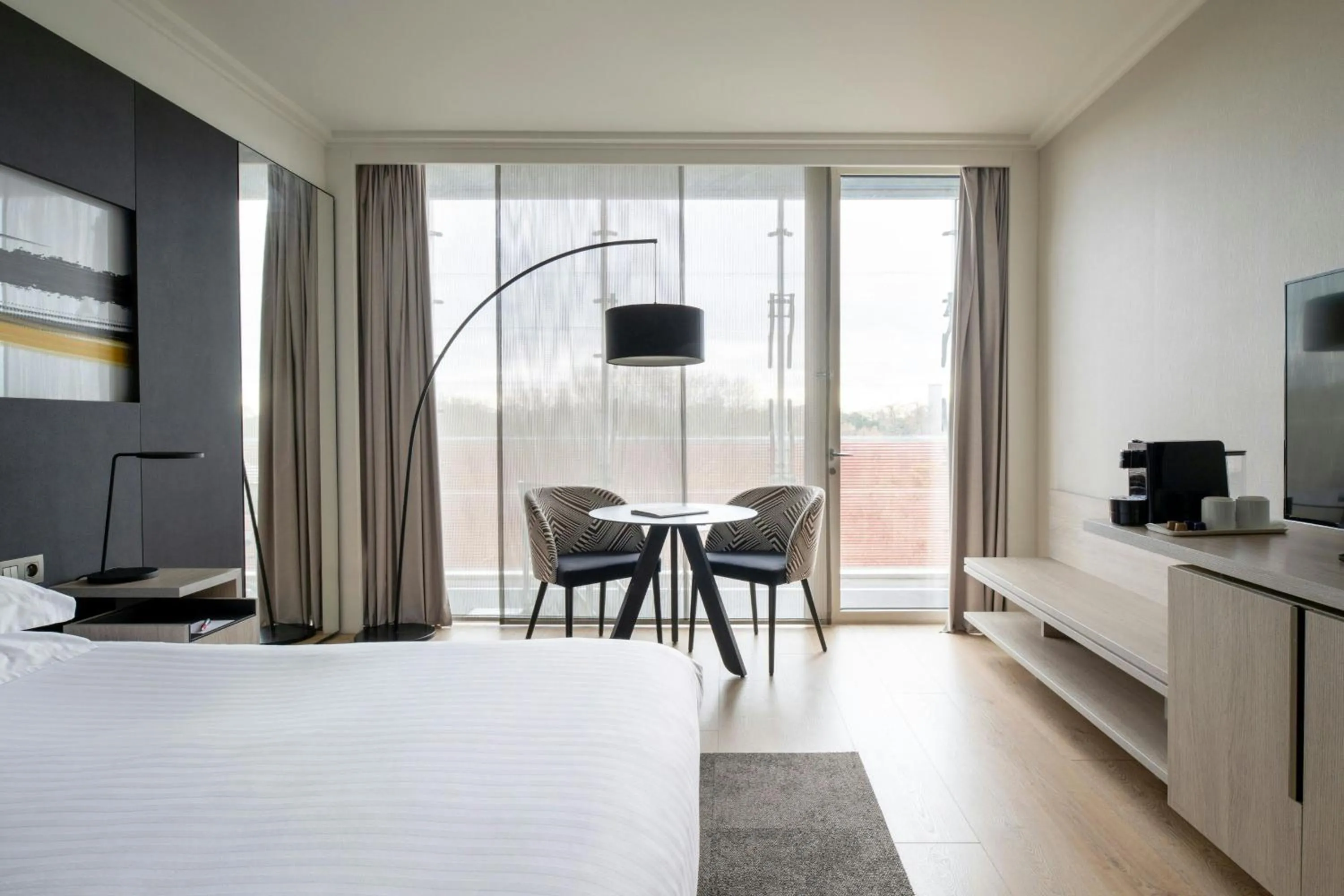 Photo of the whole room, Bed in Lyon Marriott Hotel Cité Internationale
