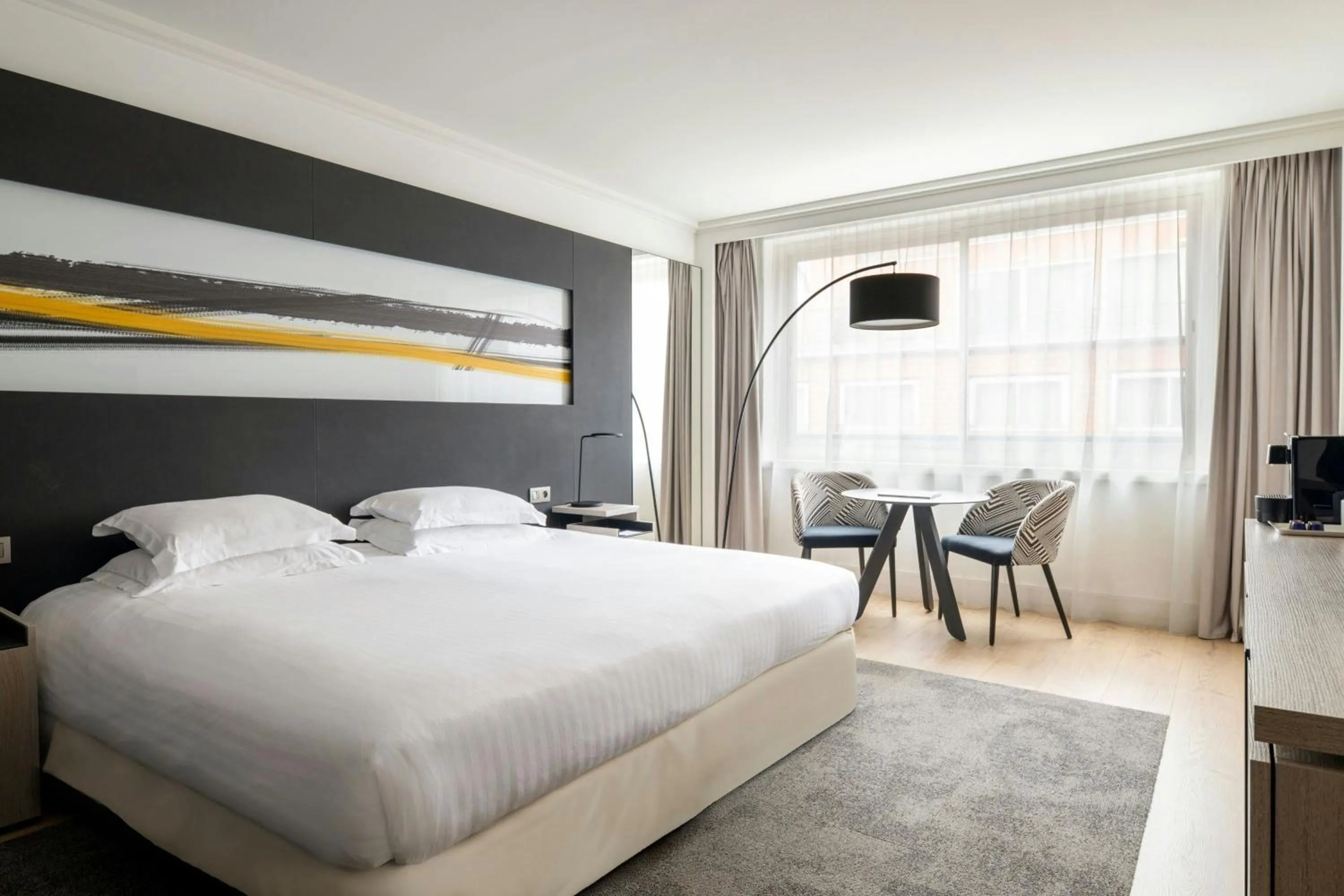 Photo of the whole room, Bed in Lyon Marriott Hotel Cité Internationale