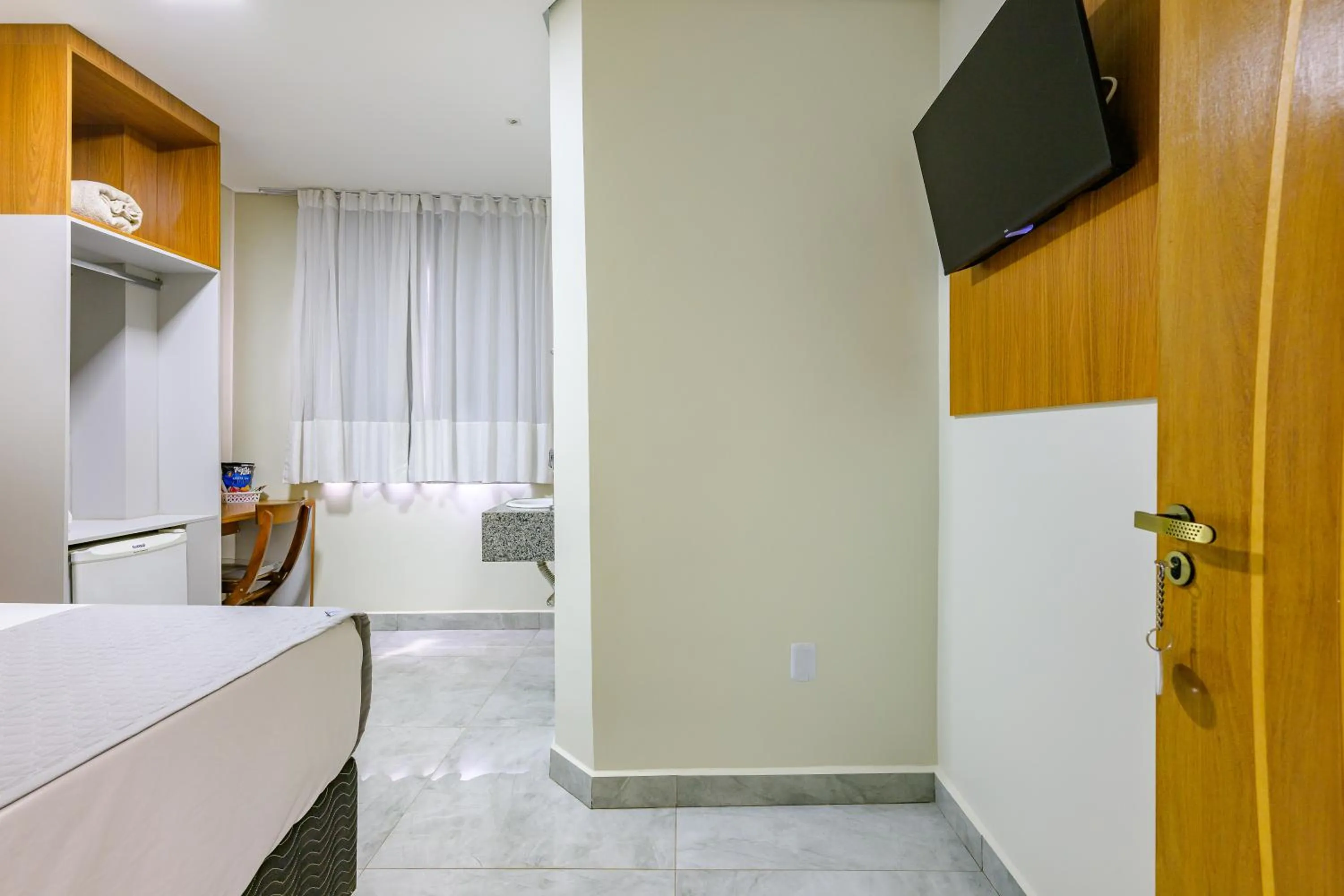 Bedroom in OYO Hotel Brisa Tropical, Brasília