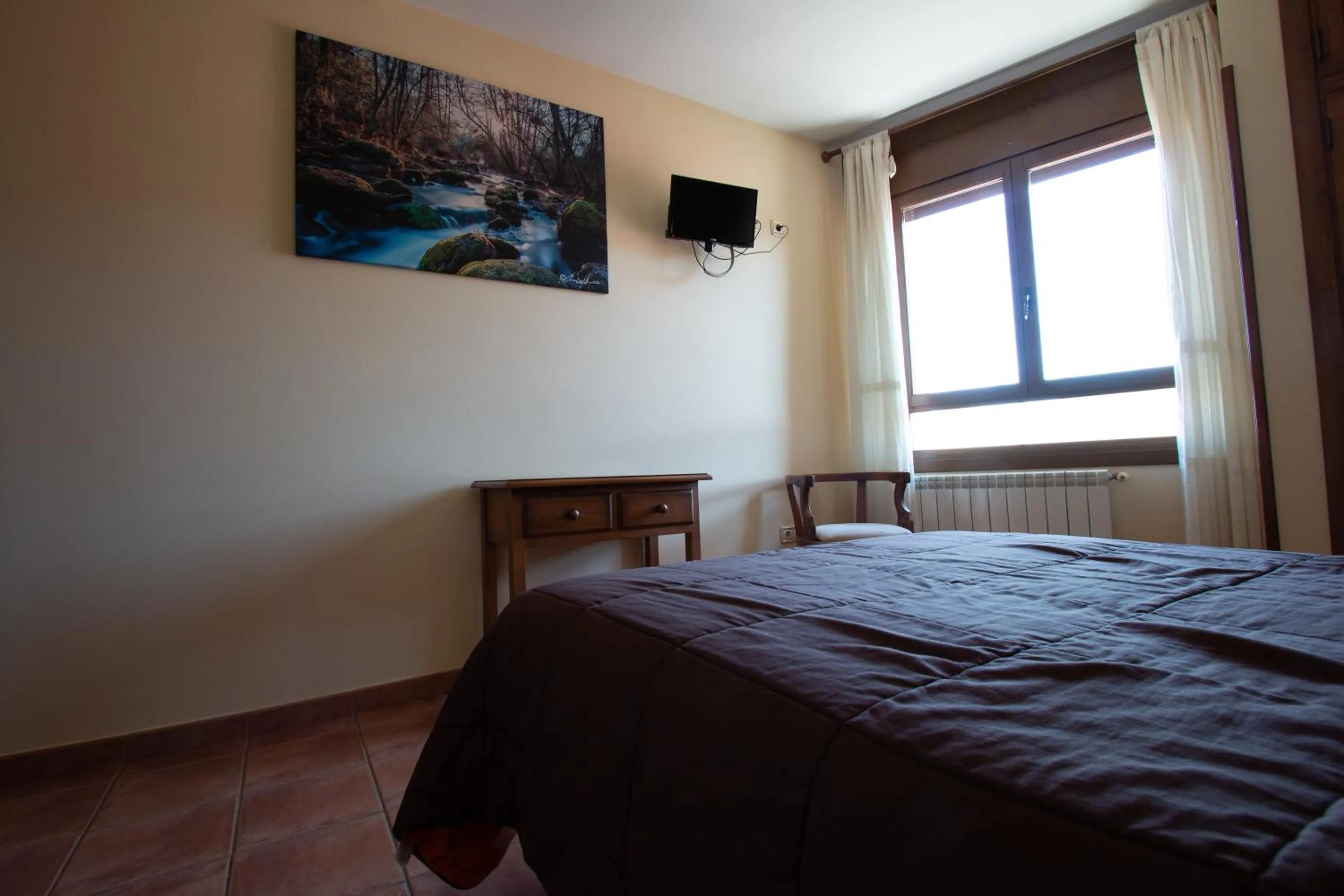 Photo of the whole room, Bed in Tirontillana