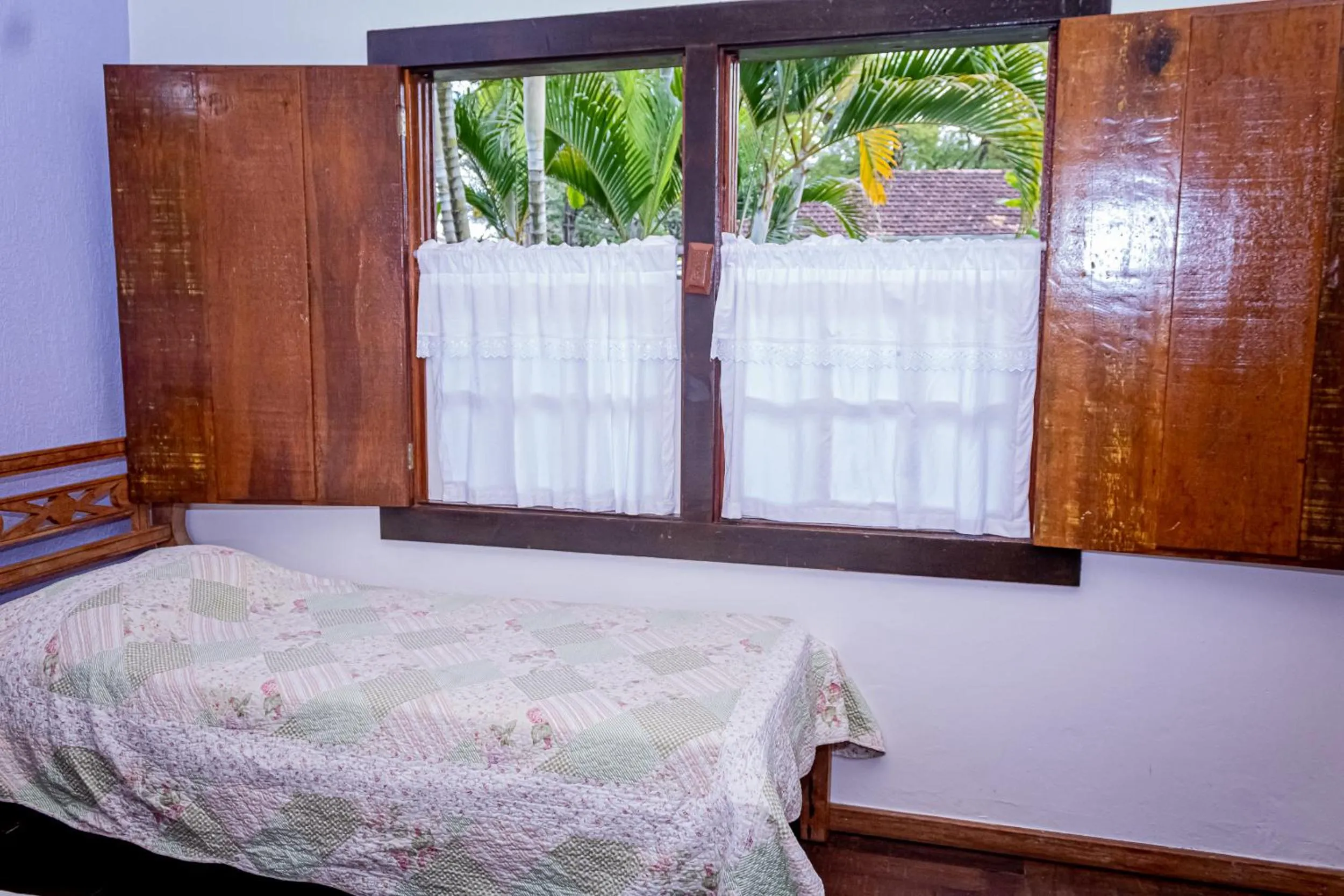 Bed in Casa de Violeta Pousada