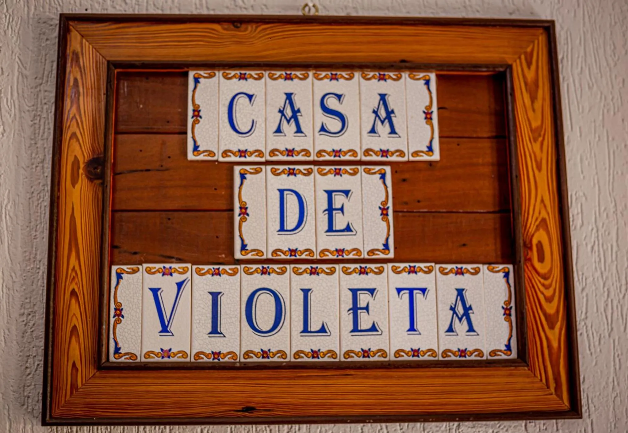 Property logo or sign in Casa de Violeta Pousada