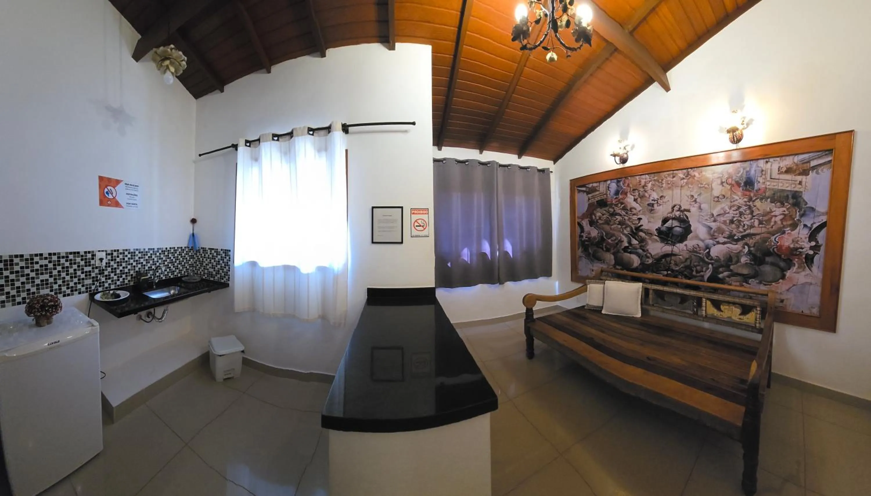 Seating area in Pousada Boutique Chico Anjo