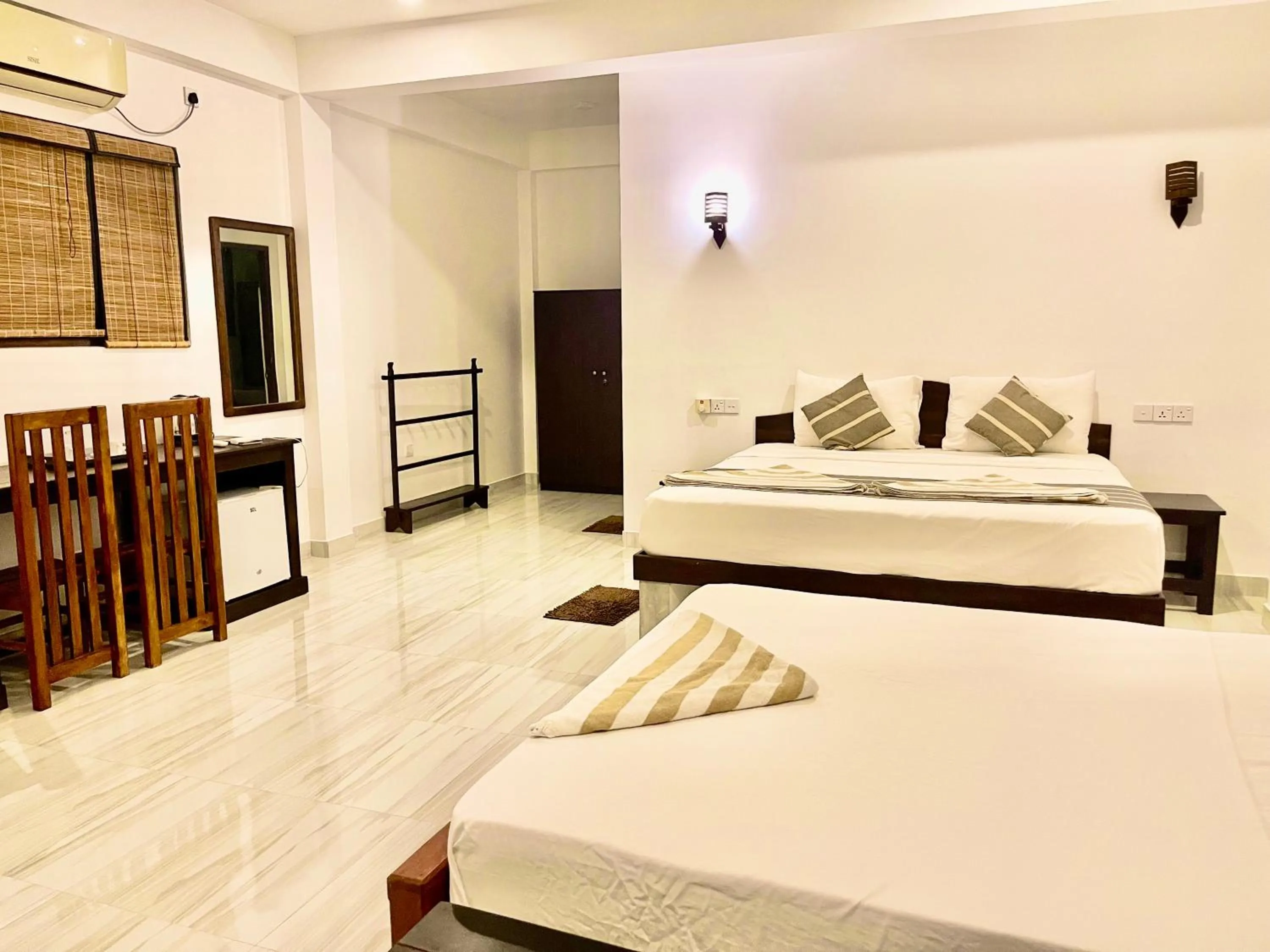 Bed in Ashansa Lagoon Resort