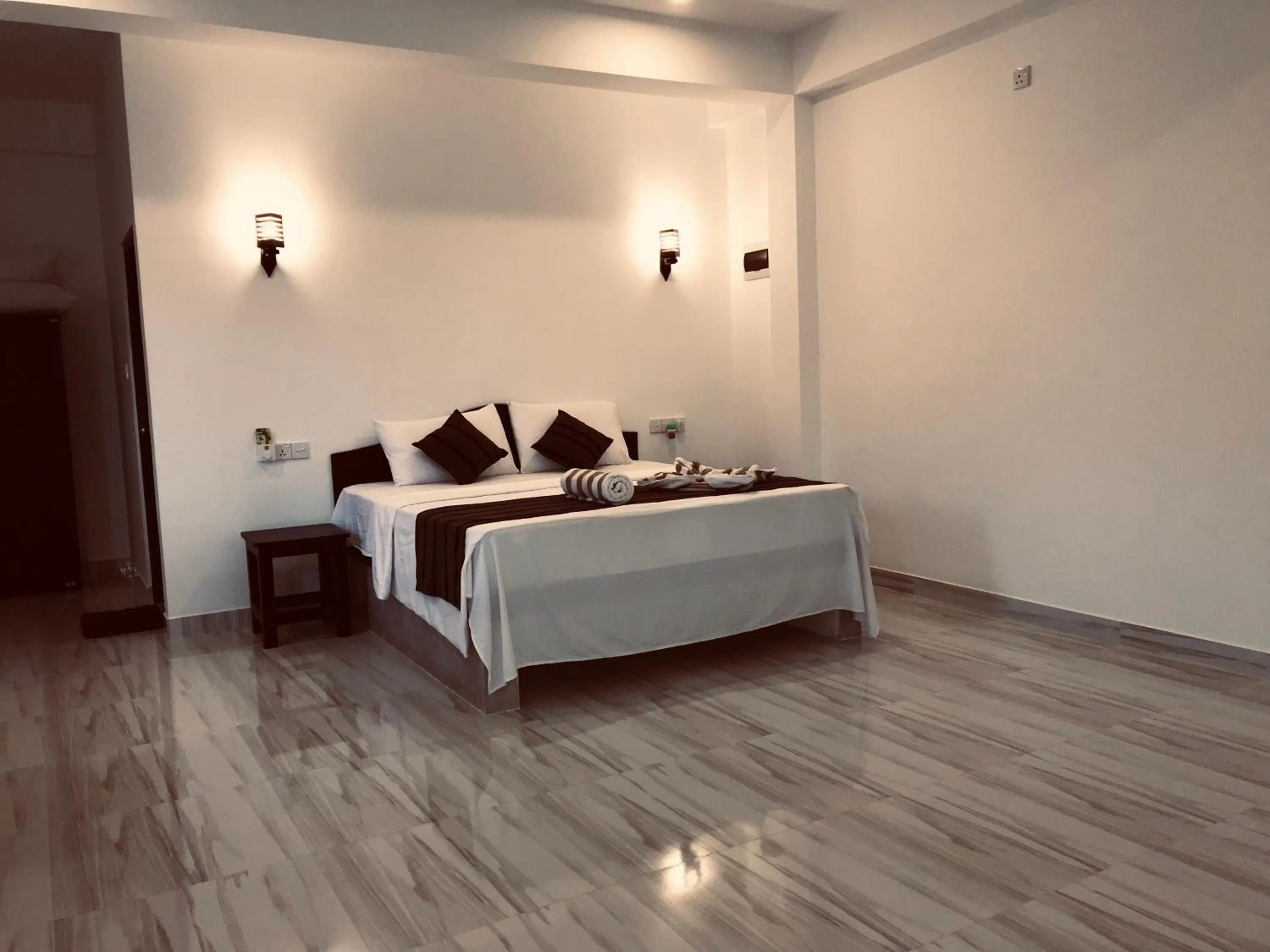 Bed in Ashansa Lagoon Resort