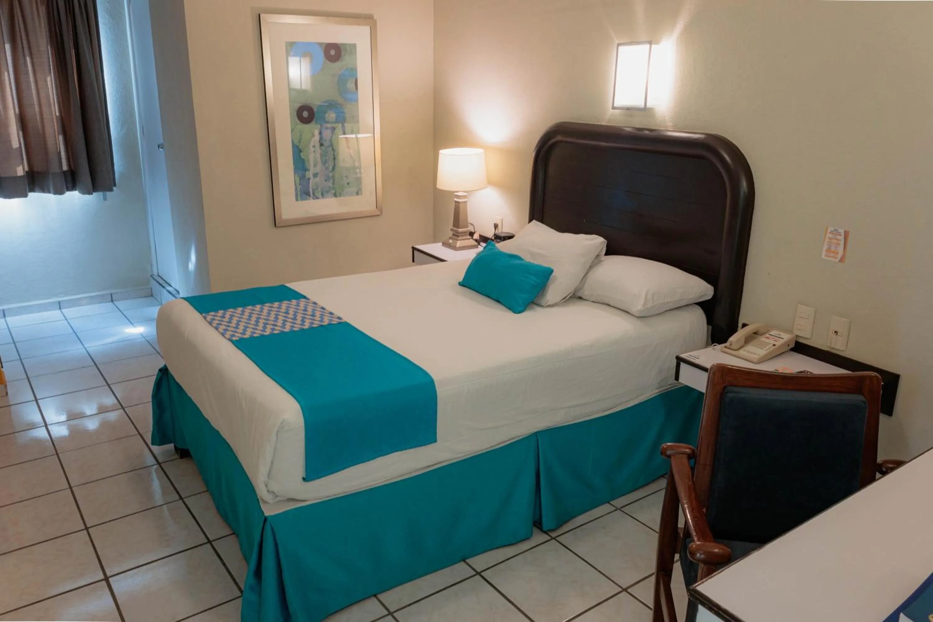 Bed in Howard Johnson by Wyndham Guanajuato Leon Avenida