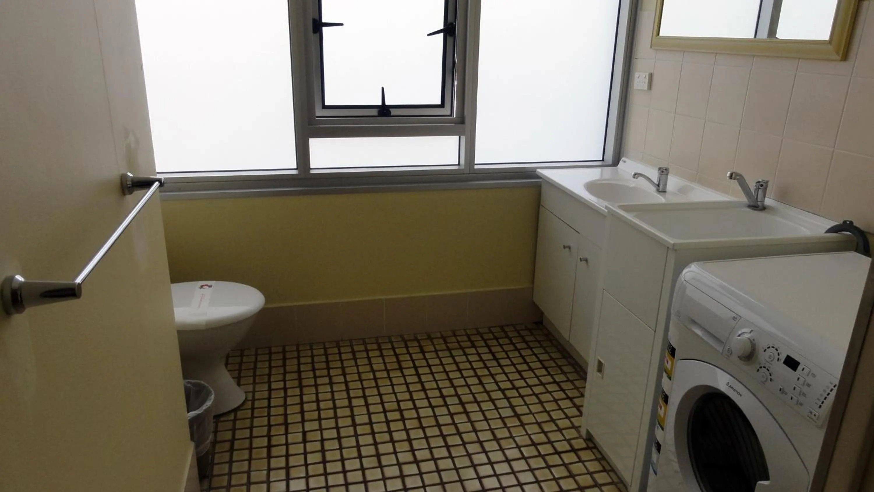 Toilet in Quarterdeck Apartments