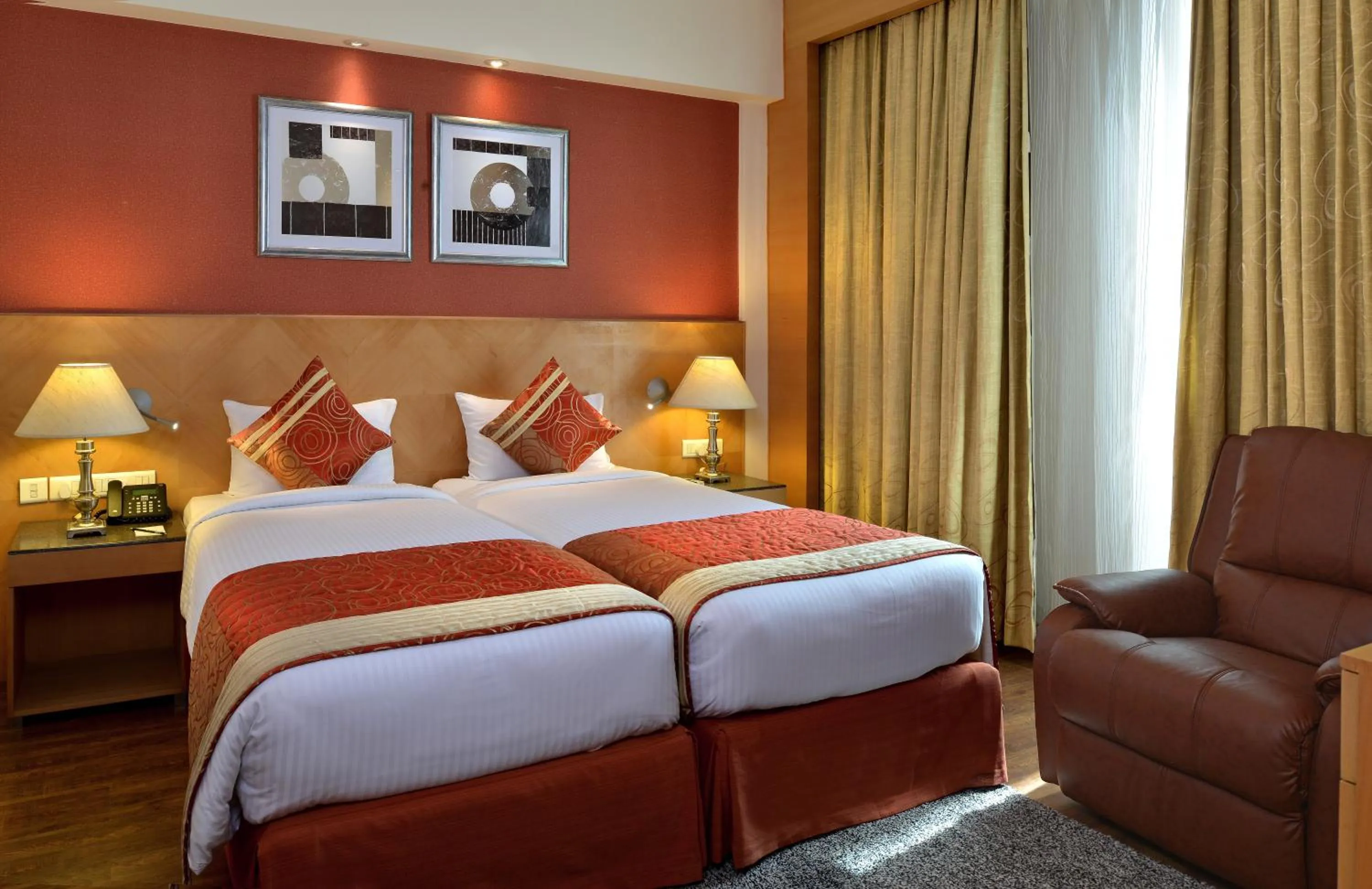 Bed in Savoy Suites Manesar
