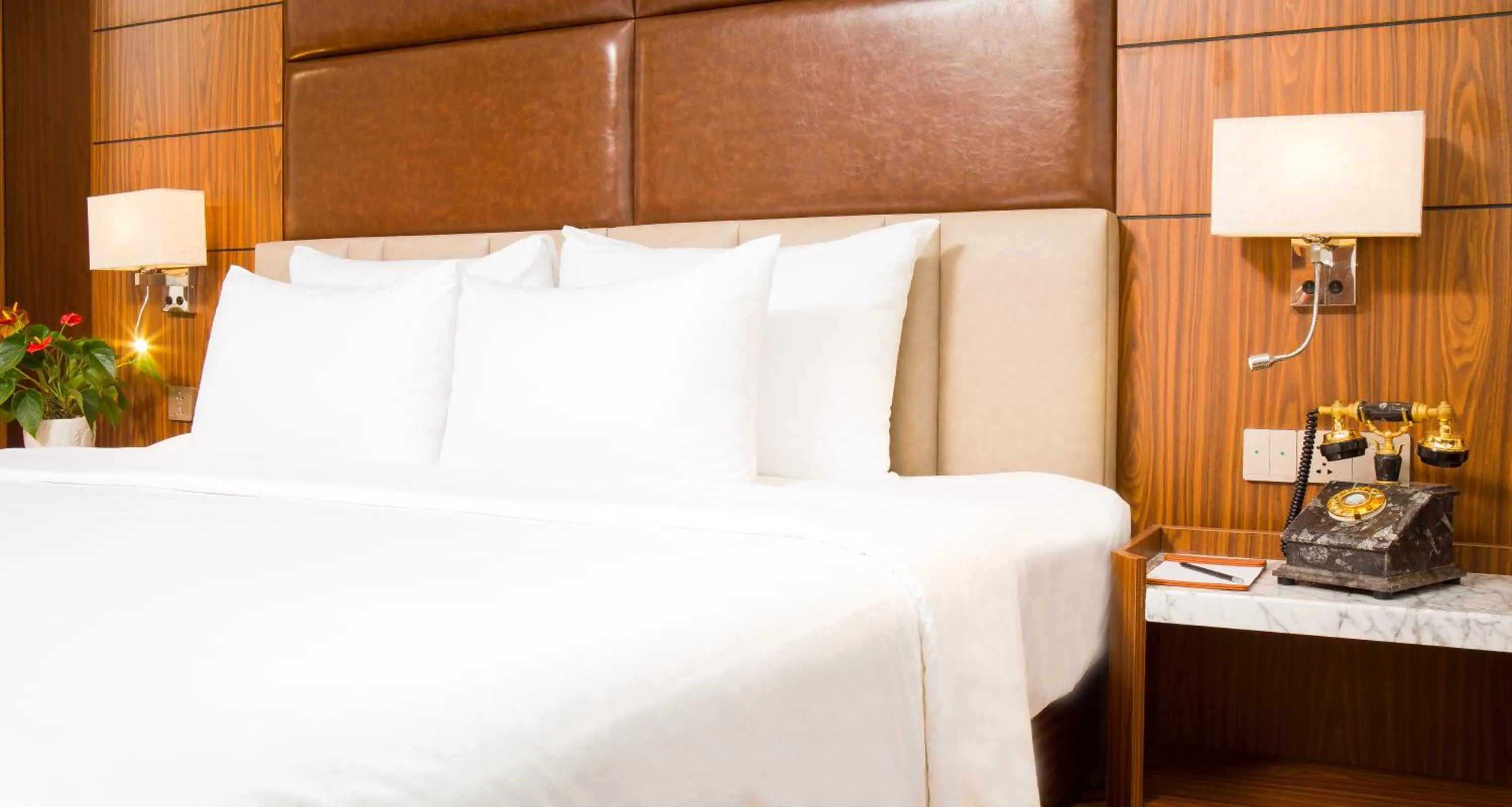 Bed in Van Phat Riverside Hotel