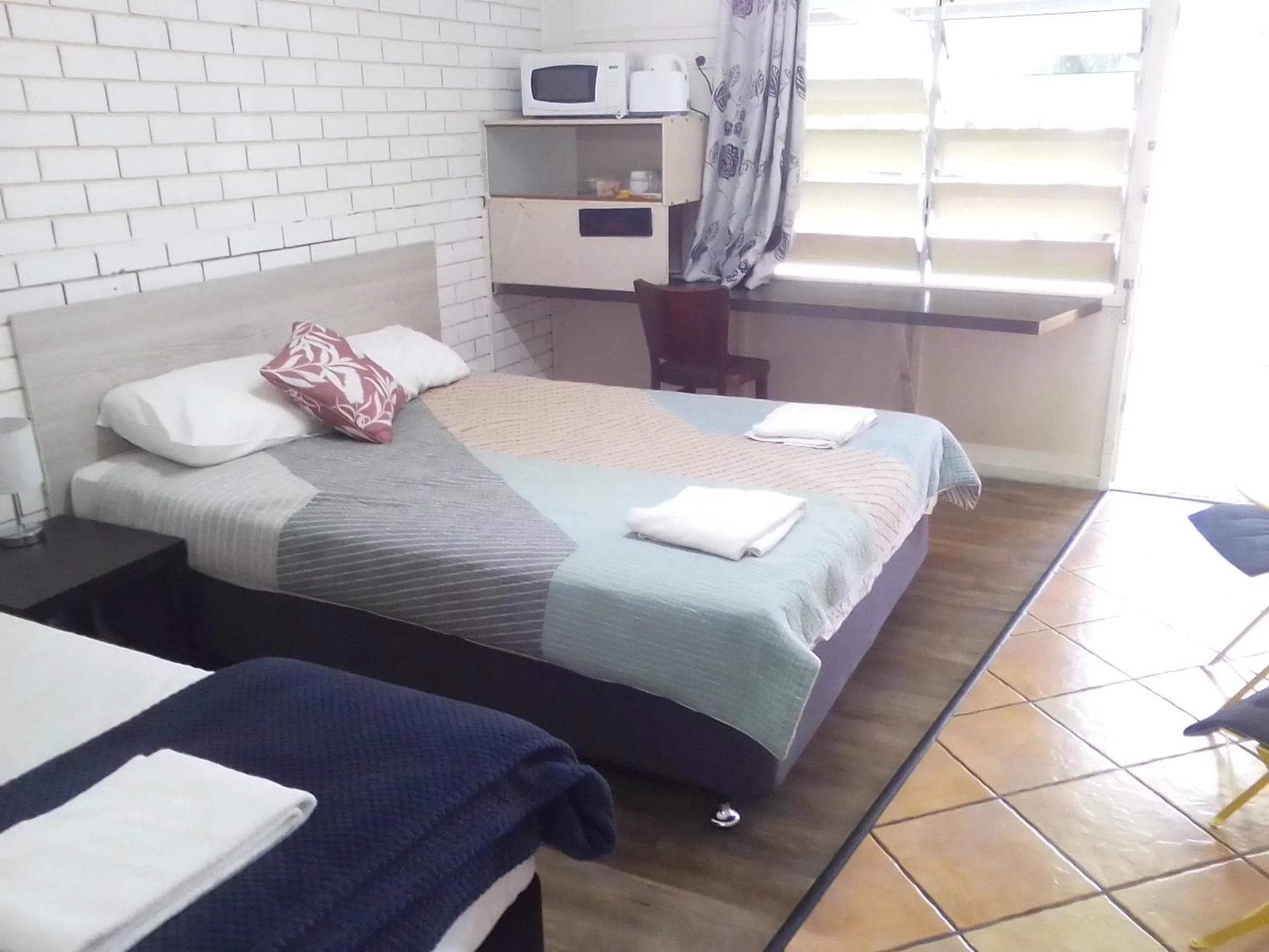 Bed in Paradise Motel