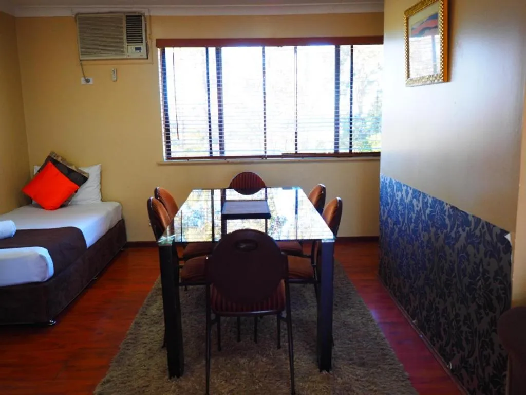 Bed in Bella Vista Motel