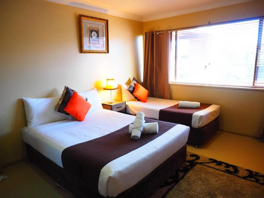 Bed in Bella Vista Motel