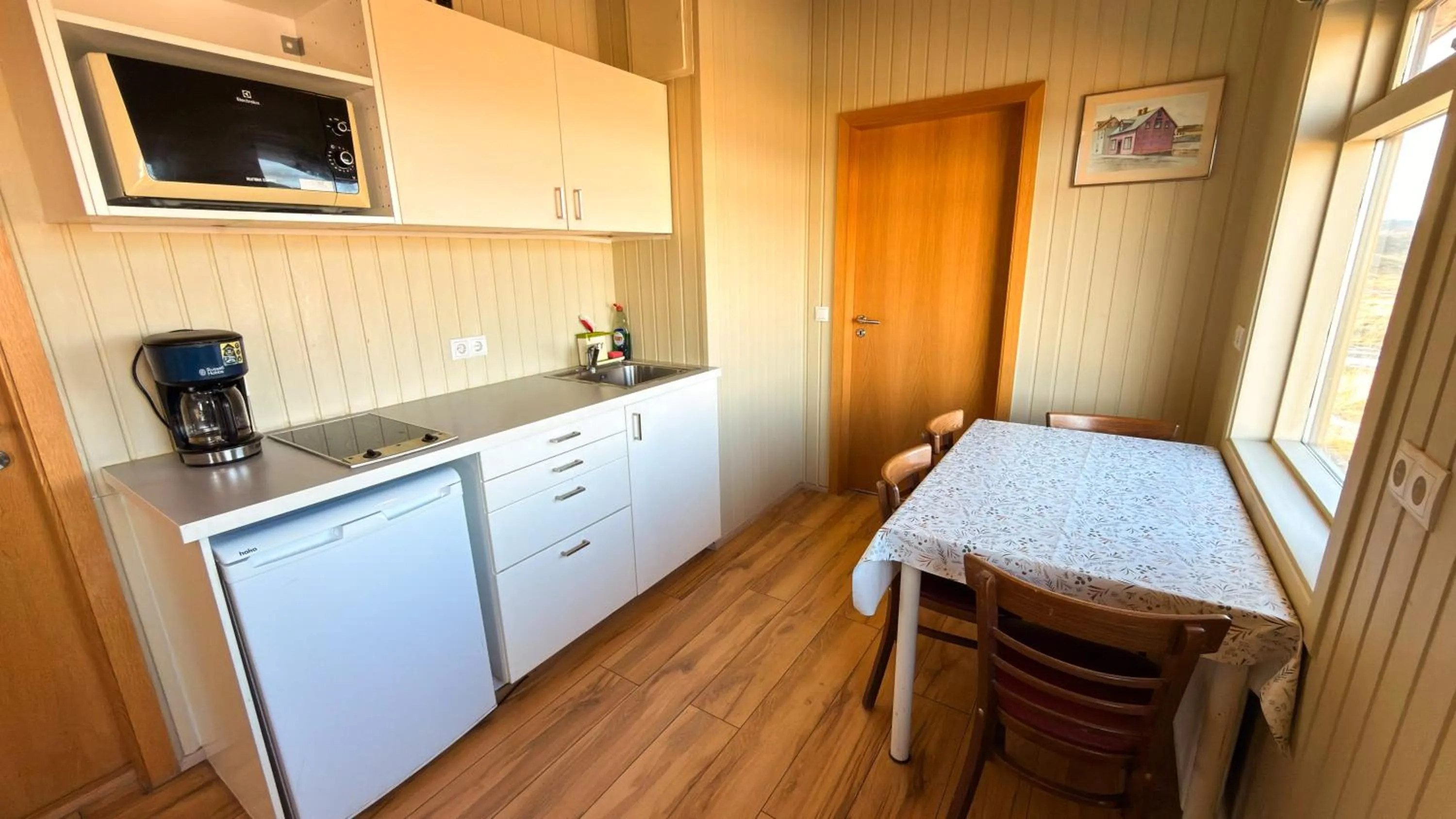 Kitchen or kitchenette in Fossatún Sunset Cottage