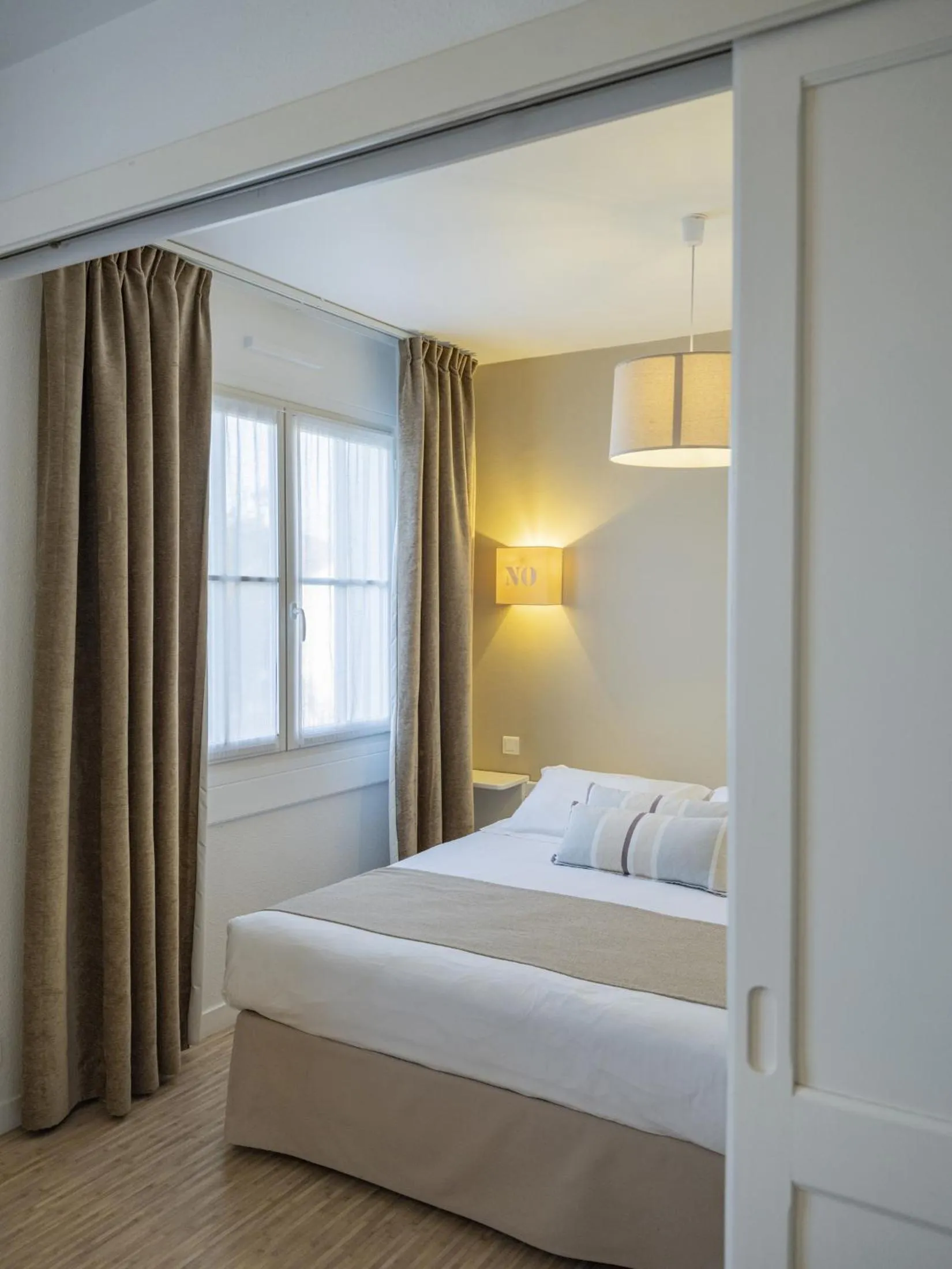 Bed in Hotel Autre Mer