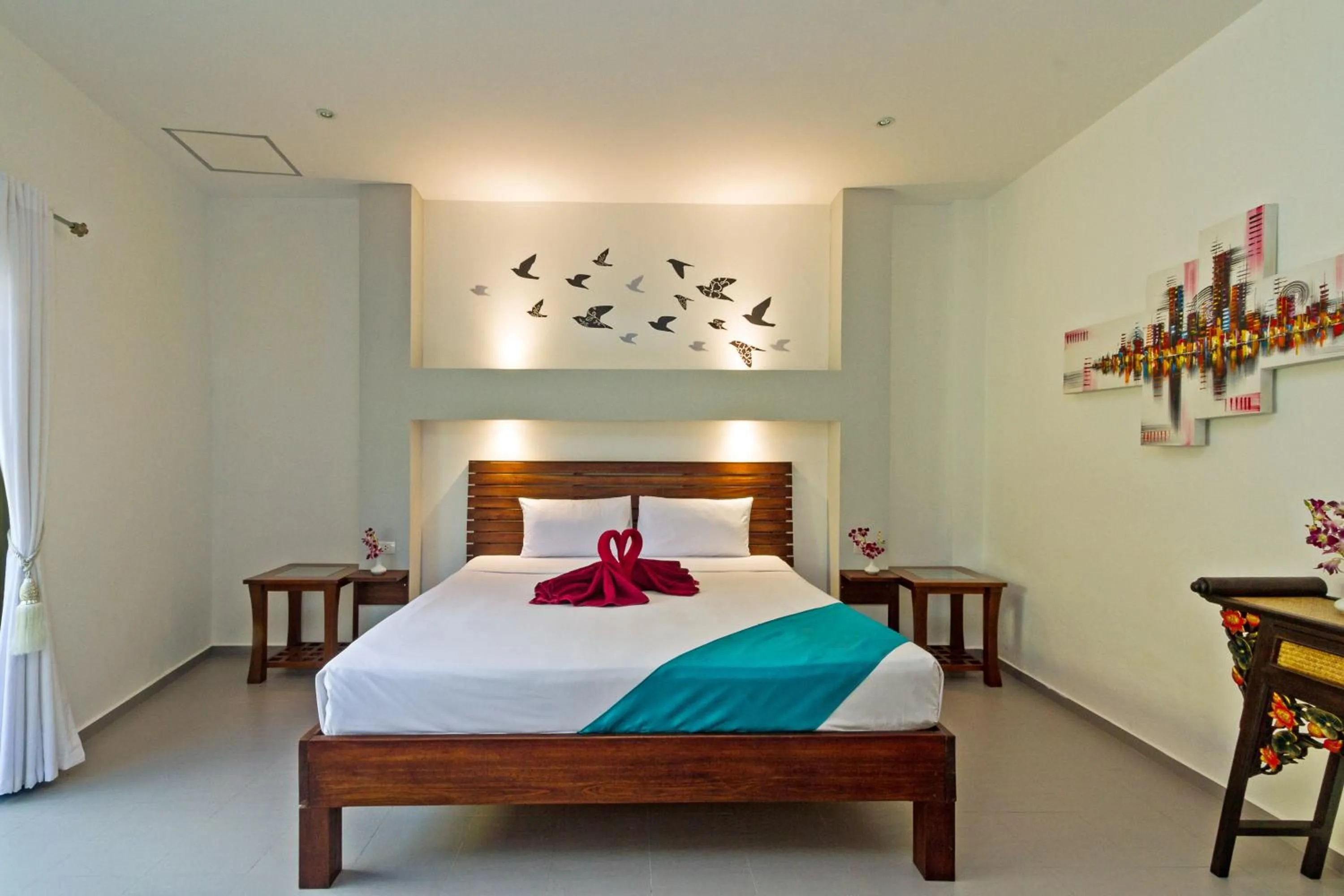 Photo of the whole room, Bed in Austrian Garden Hotel & Restaurant Patong