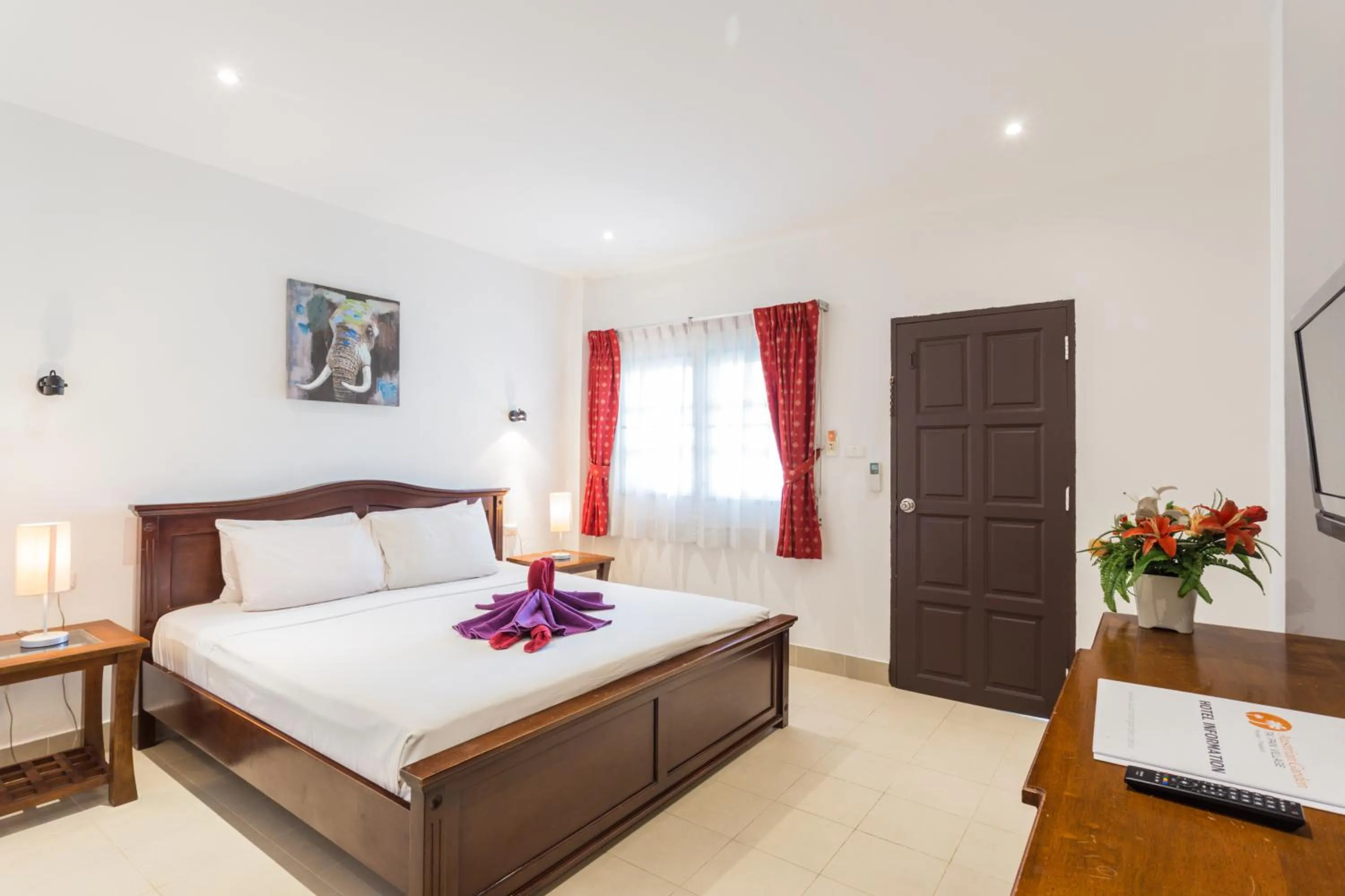 Photo of the whole room, Bed in Austrian Garden Hotel & Restaurant Patong